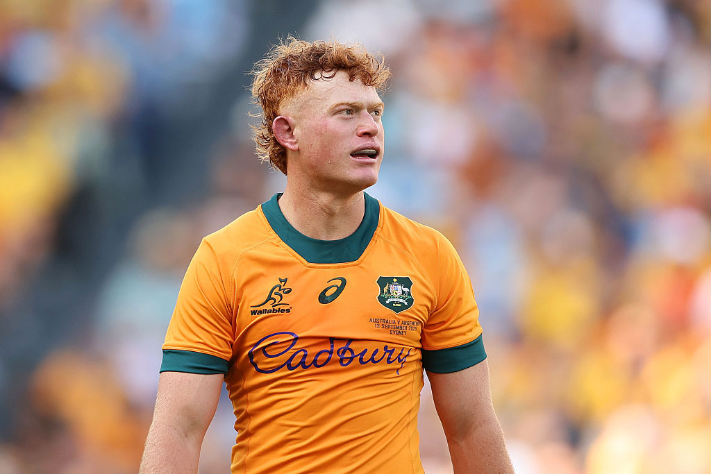 Tane Edmed of the Wallabies reacts.