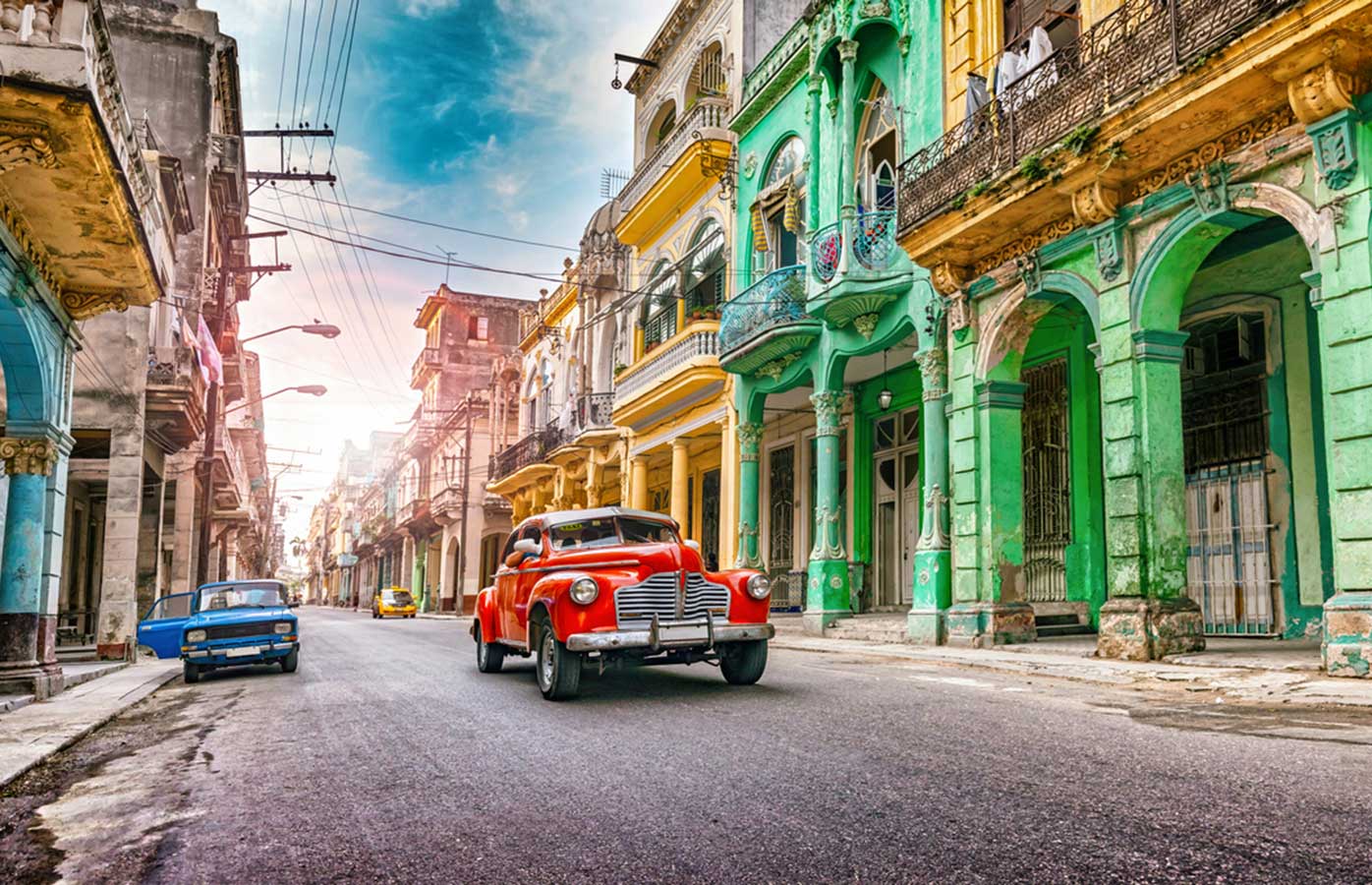 Havana, Cuba. Vintage cars and colourful architecture