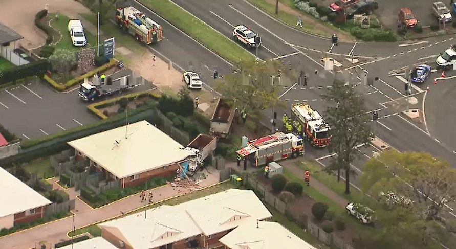 Emergency services are at the scene of a serious truck crash.