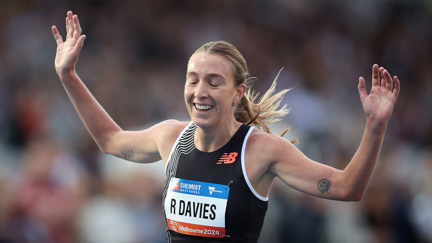 Rose Davies celebrates winning a 5000m race in Melbourne this year.