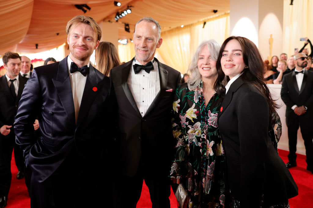 HOLLYWOOD, CALIFORNIA - MARCH 10: (L-R) Finneas O'Connell, Patrick O'Connell, Maggie Baird, and Billie Eilish attend the 96th Annual Academy Awards on March 10, 2024 in Hollywood, California. (Photo by Emma McIntyre/Getty Images)