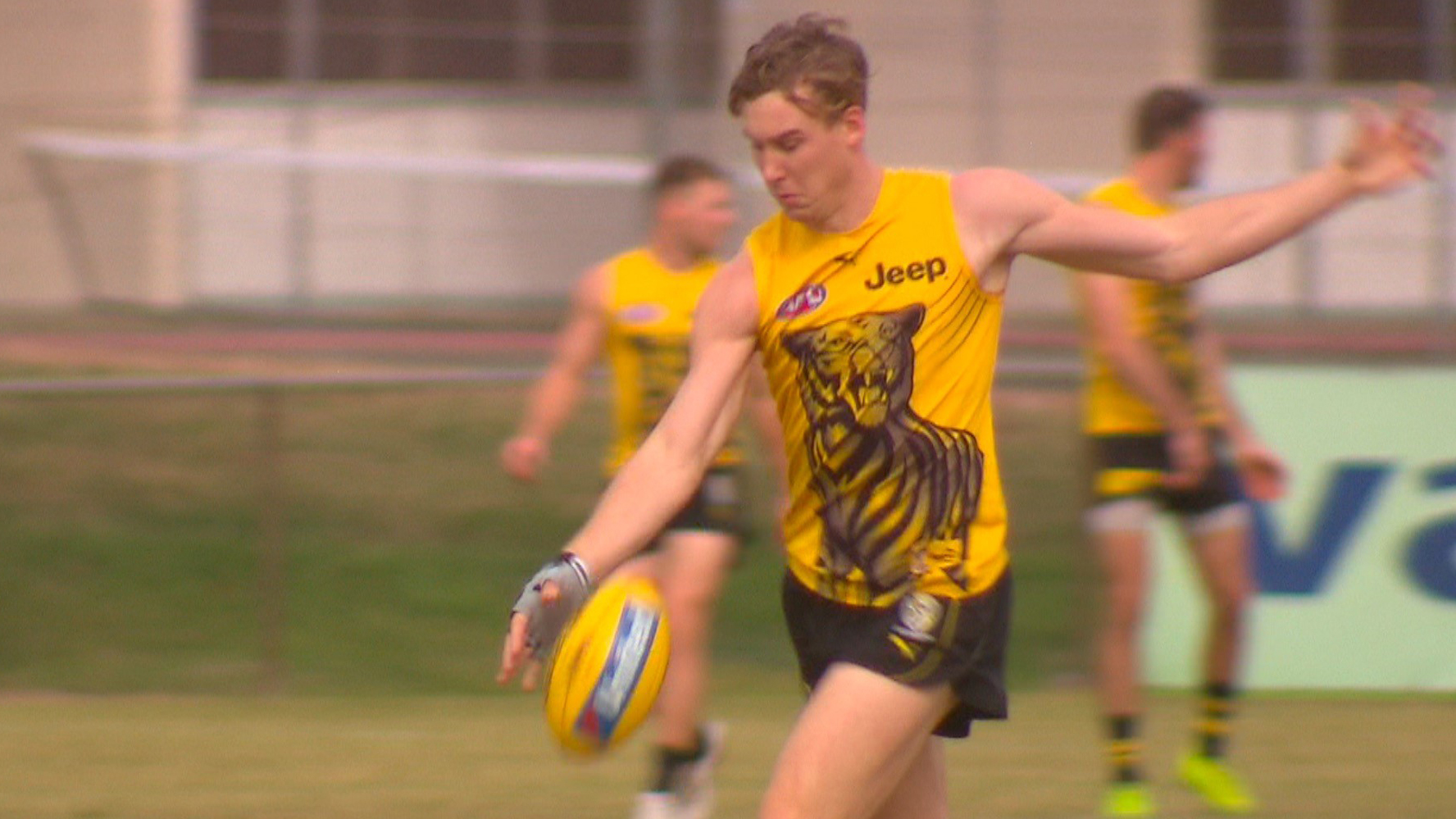 Tom Lynch training with a protective glove.