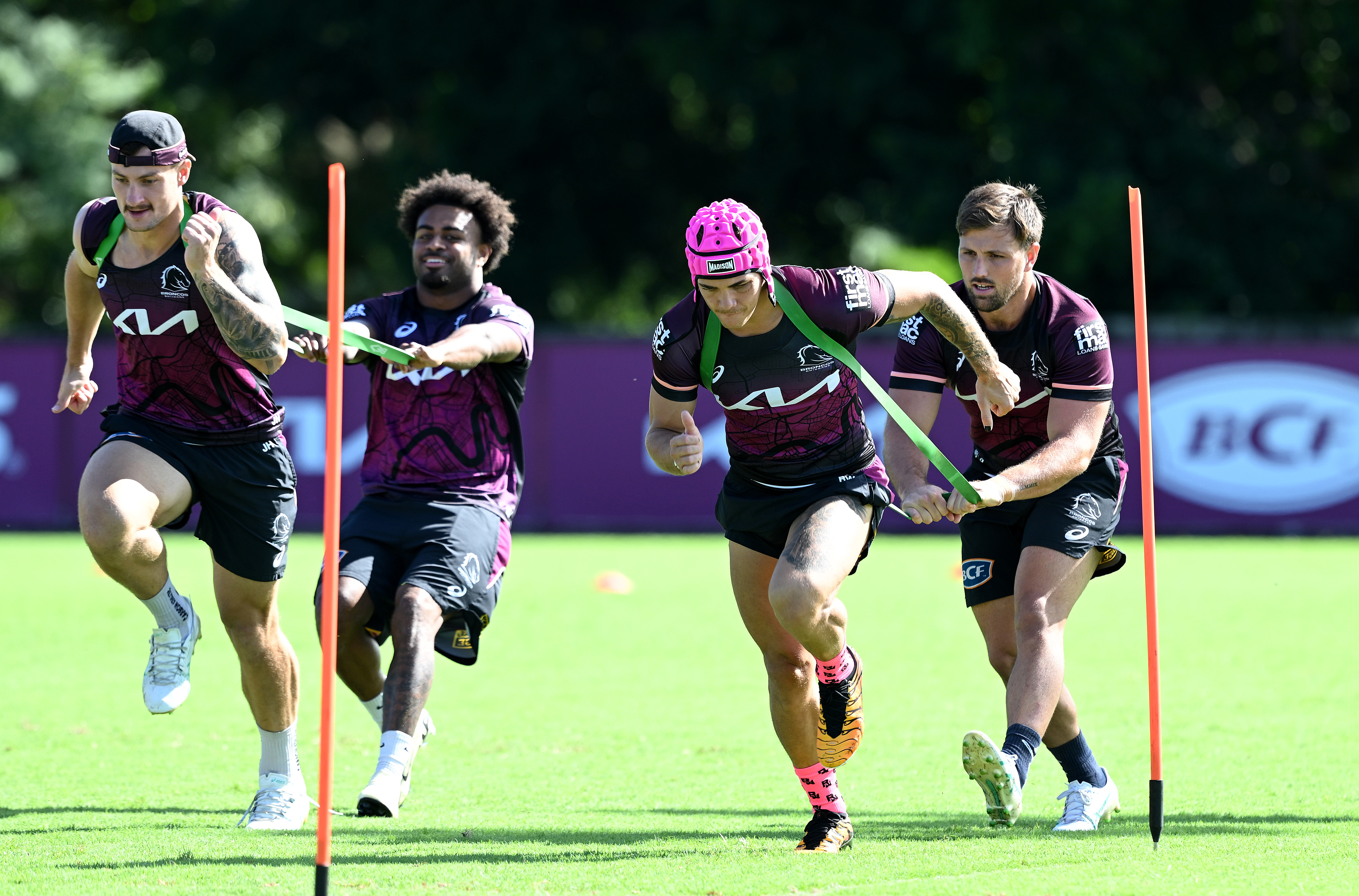Reece Walsh competes in a training drill during a Broncos training session. (Photo by Bradley Kanaris/Getty Images)