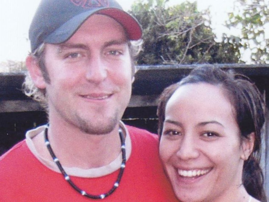 Omega Ruston, pictured with his partner Courtney, was shot dead on the Gold Coast Highway in 2009.