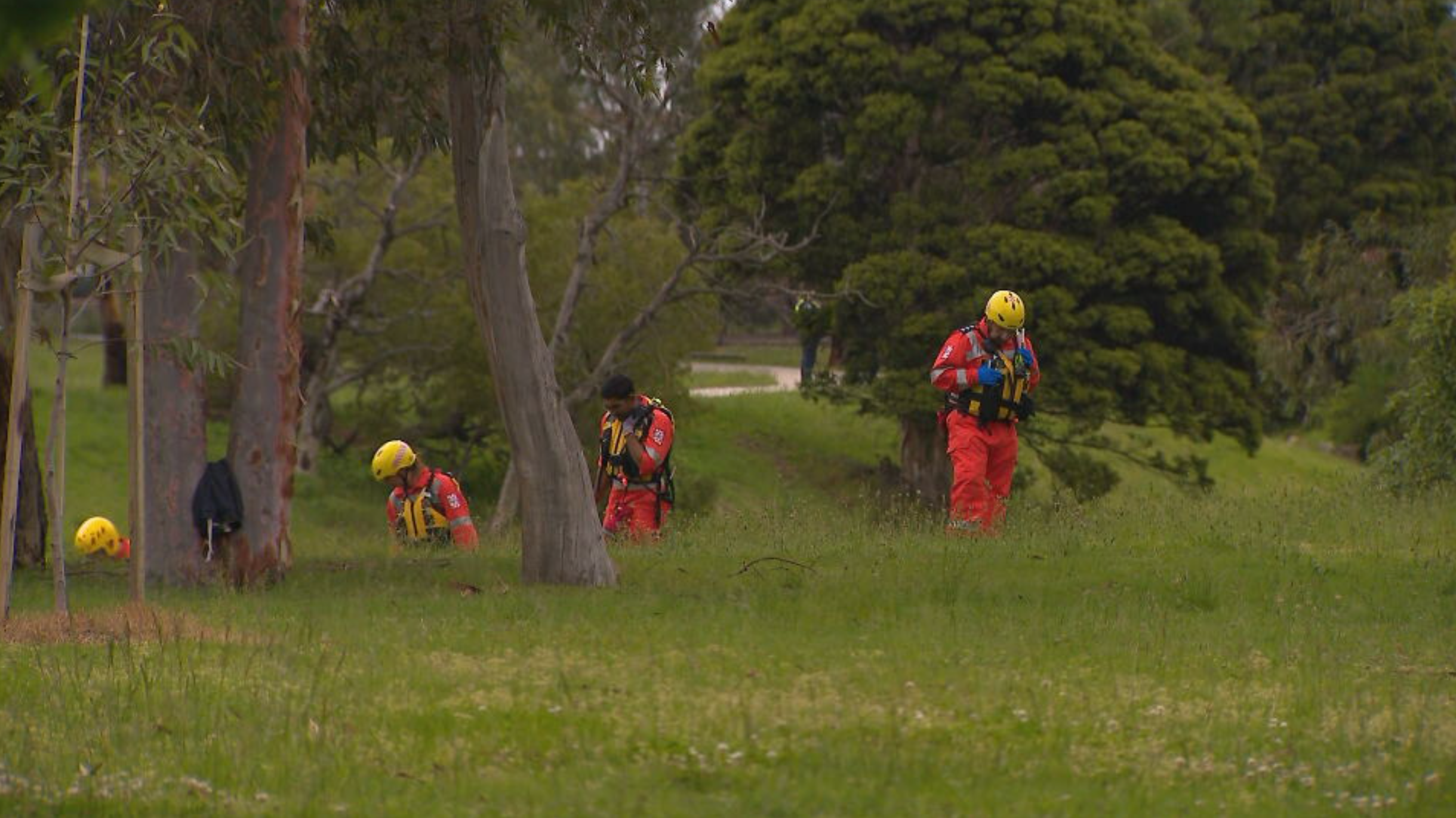 SES crews conducted a line search around the creek where the bodies were found. 