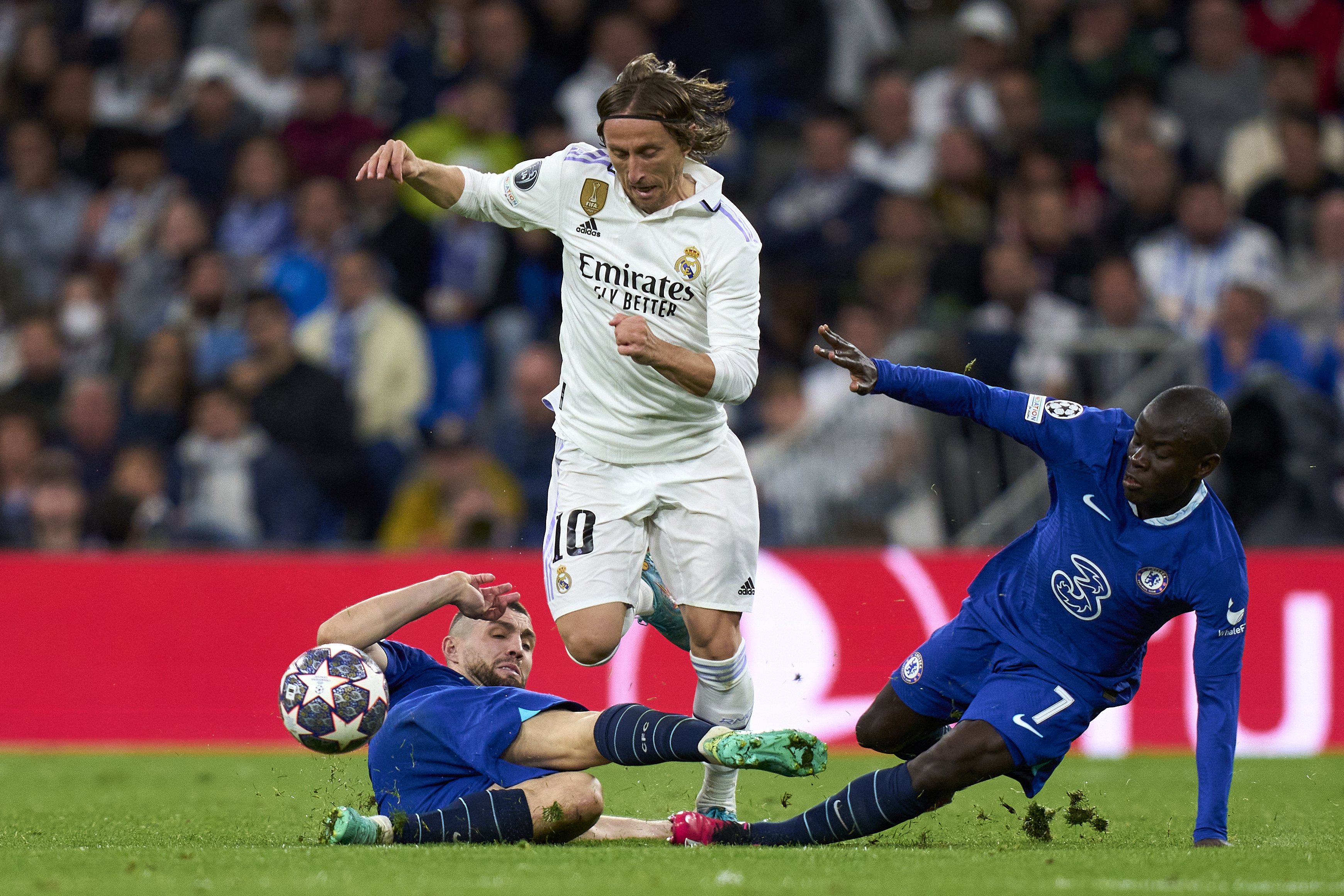 Luka Modric of Real Madrid battles for the ball.