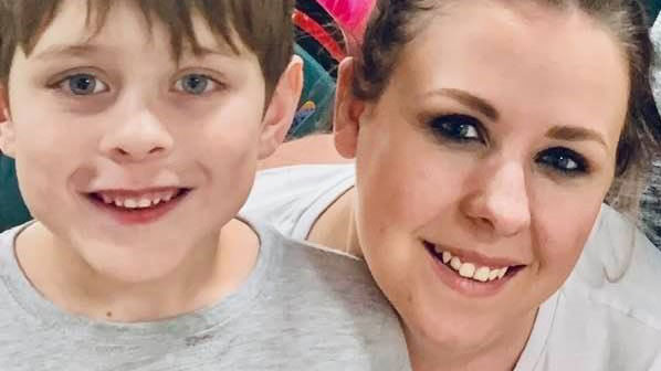 Ms Trimboli, pictured with her eight-year-old son, has been told she will need to wait about 18 months to have laparoscopy in the public health system.