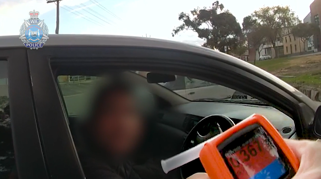 A man has been caught allegedly driving under the influence after police noticed a beer bottle sitting on the roof of his car. ﻿