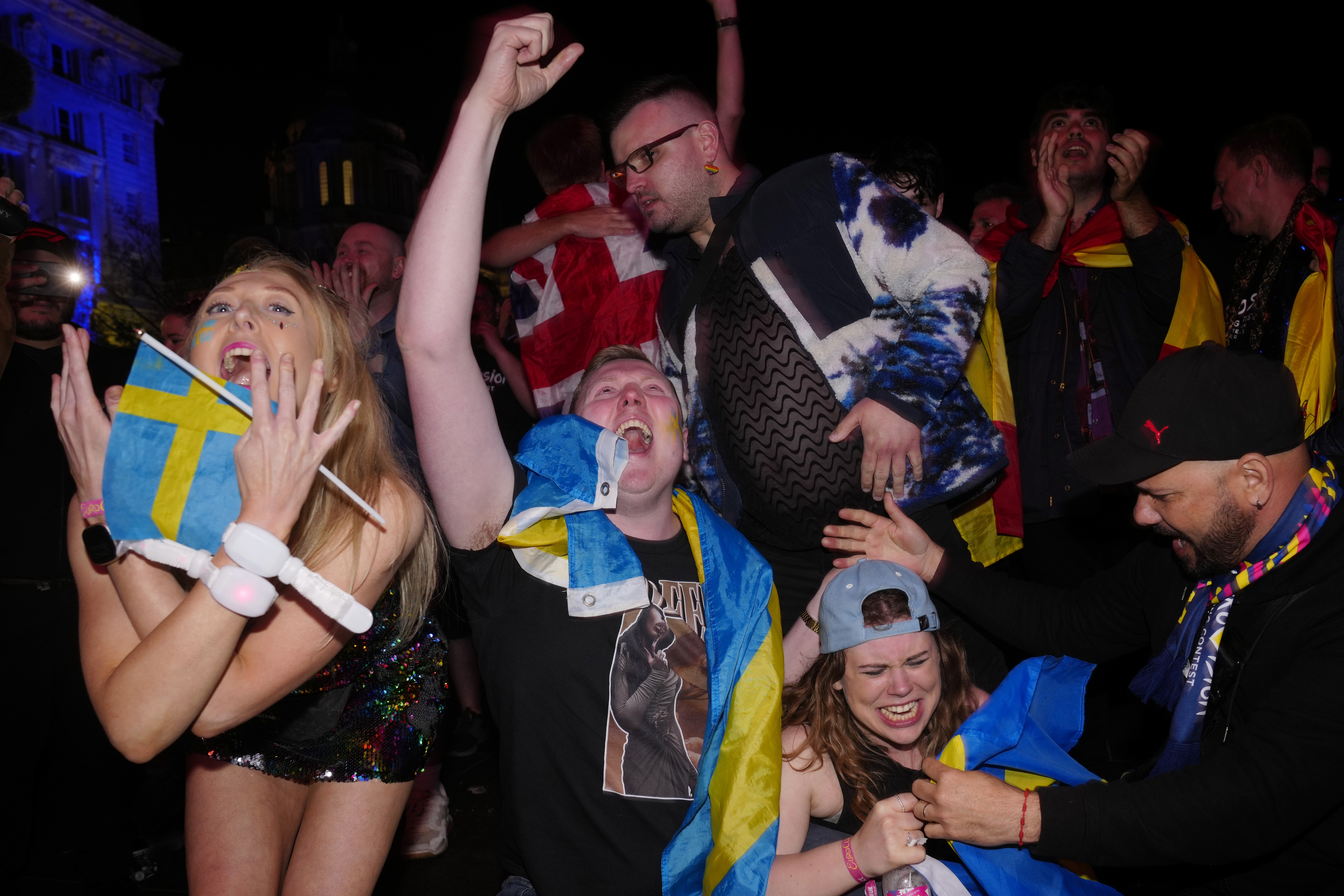 Swedish Eurovision fans in the Fan Zone react as Loreen of Sweden wins Grand Final of the Eurovision Song Contest in Liverpool, England.