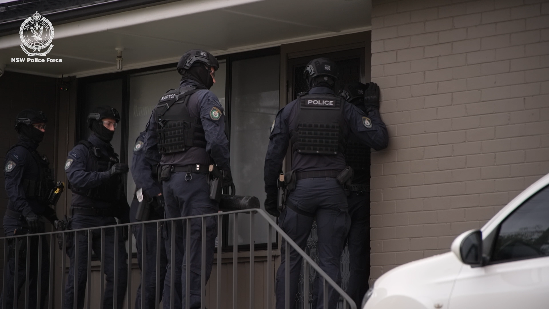 An arrest was made at the Busby house.