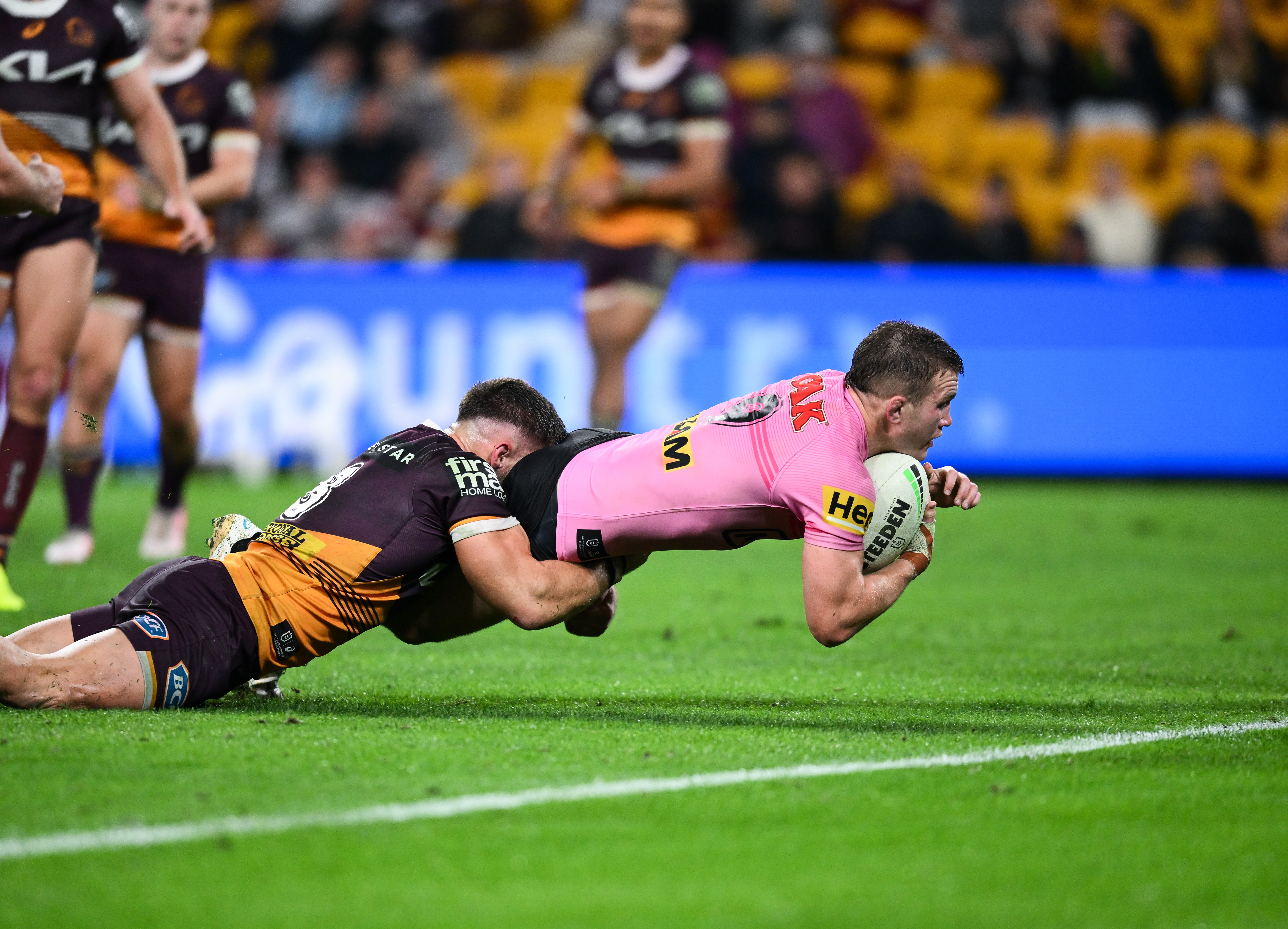 Mitch Kenny scoring for the Panthers against the Broncos at Suncorp Stadium in round 18.