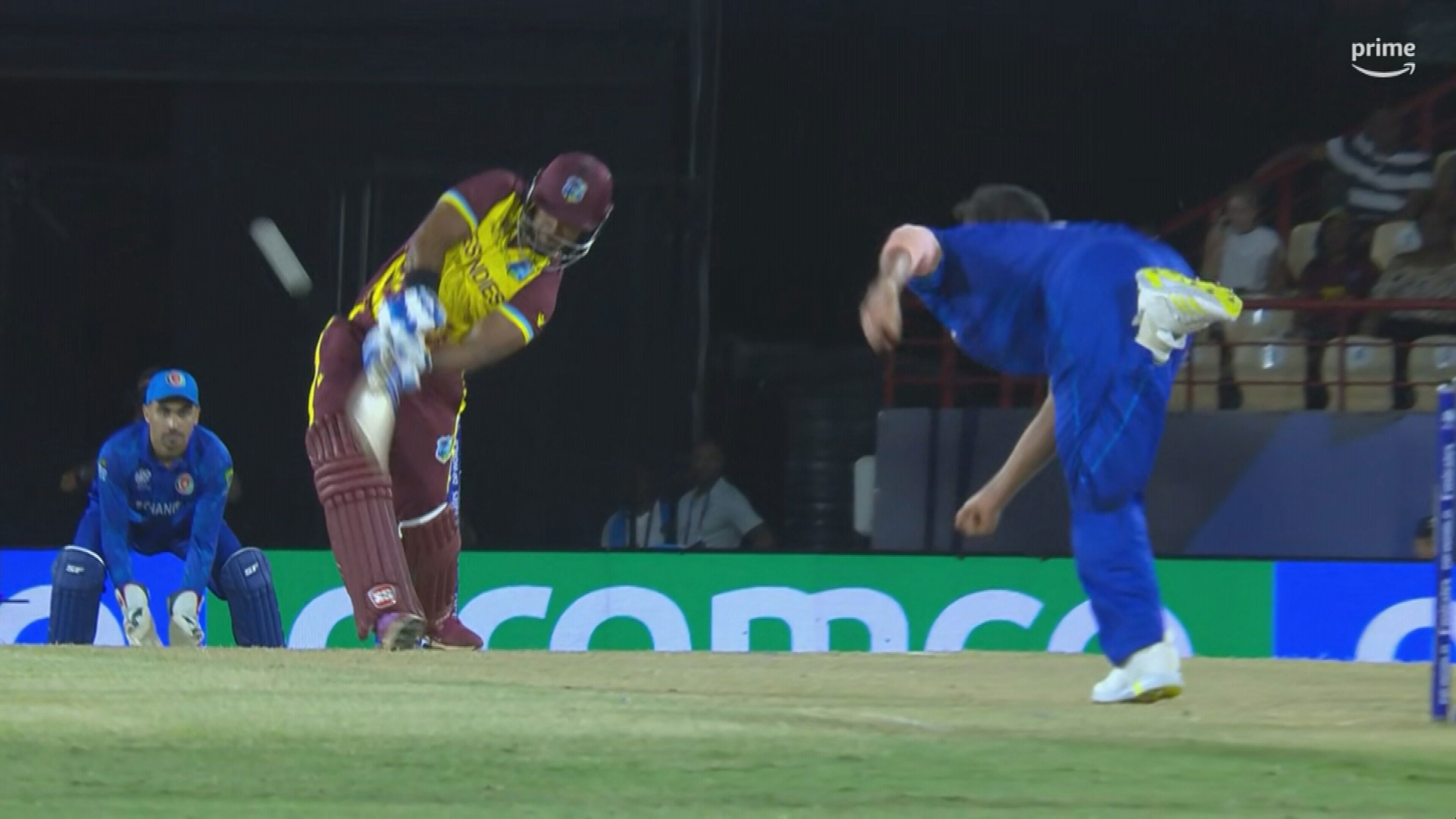 Nicholas Pooran hits Azmatullah Omarzai for six.