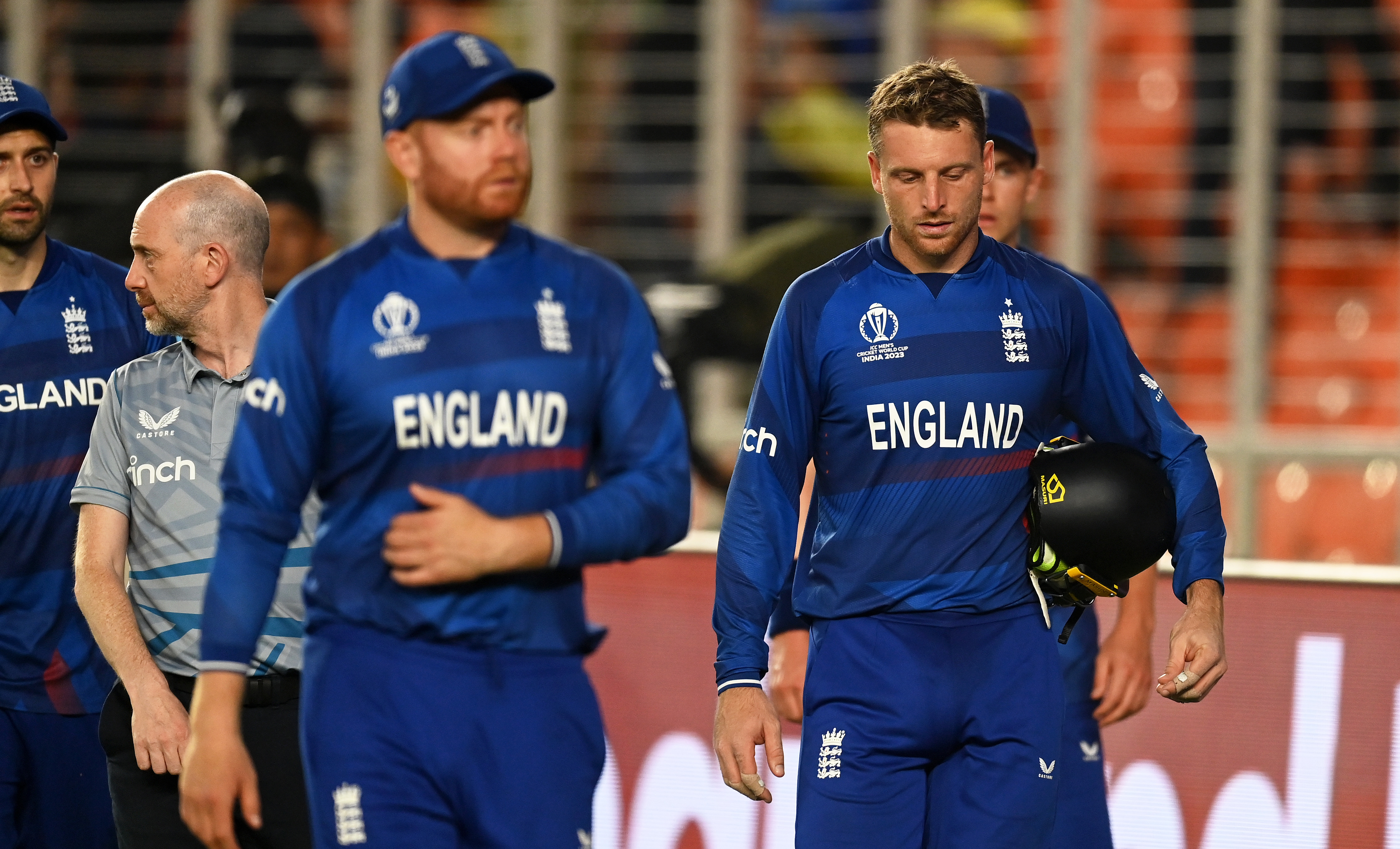 Jos Buttler of England cuts a dejected figure after losing to New Zealand.