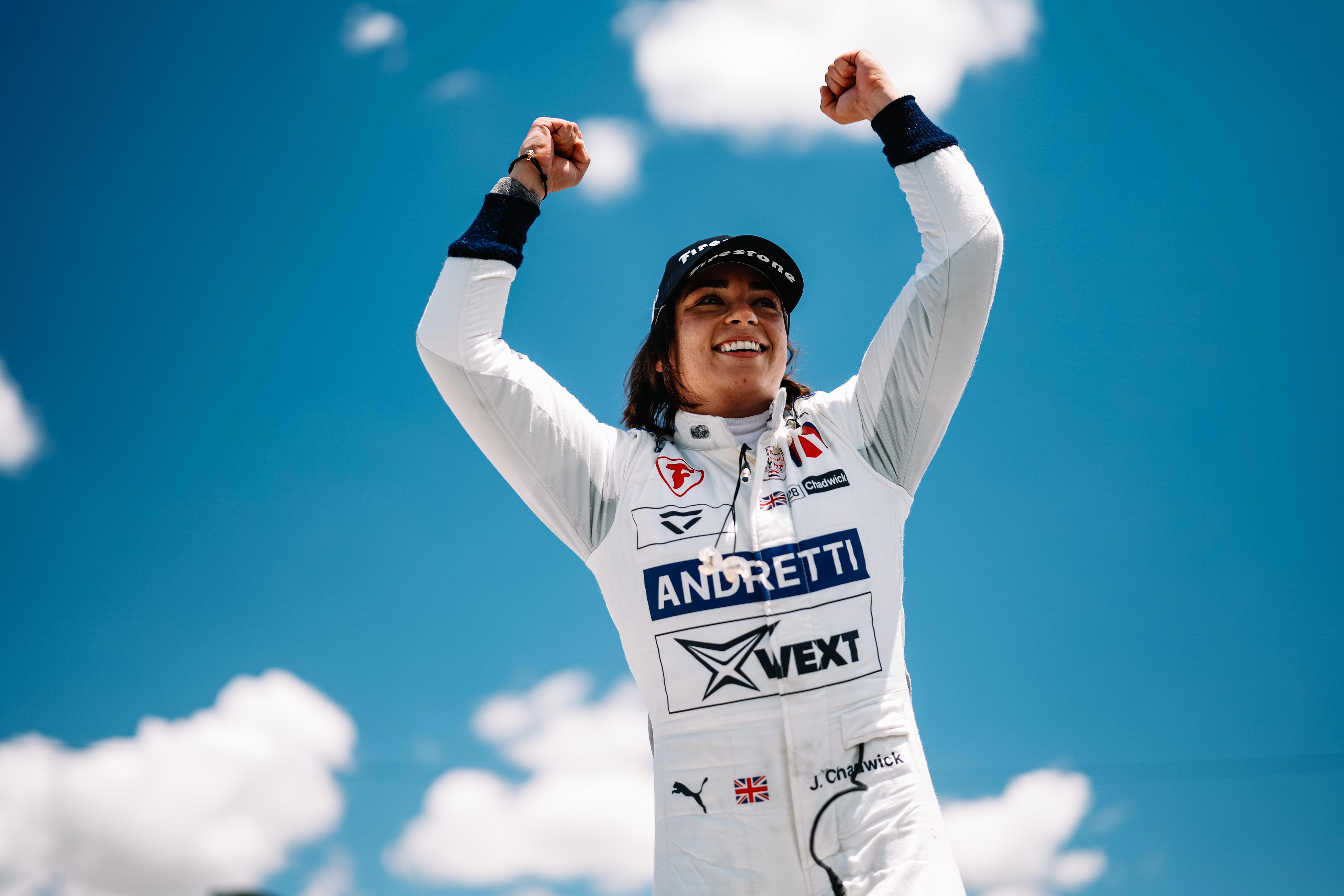 Jamie Chadwick celebrates winning the Indy NXT race at Road America.