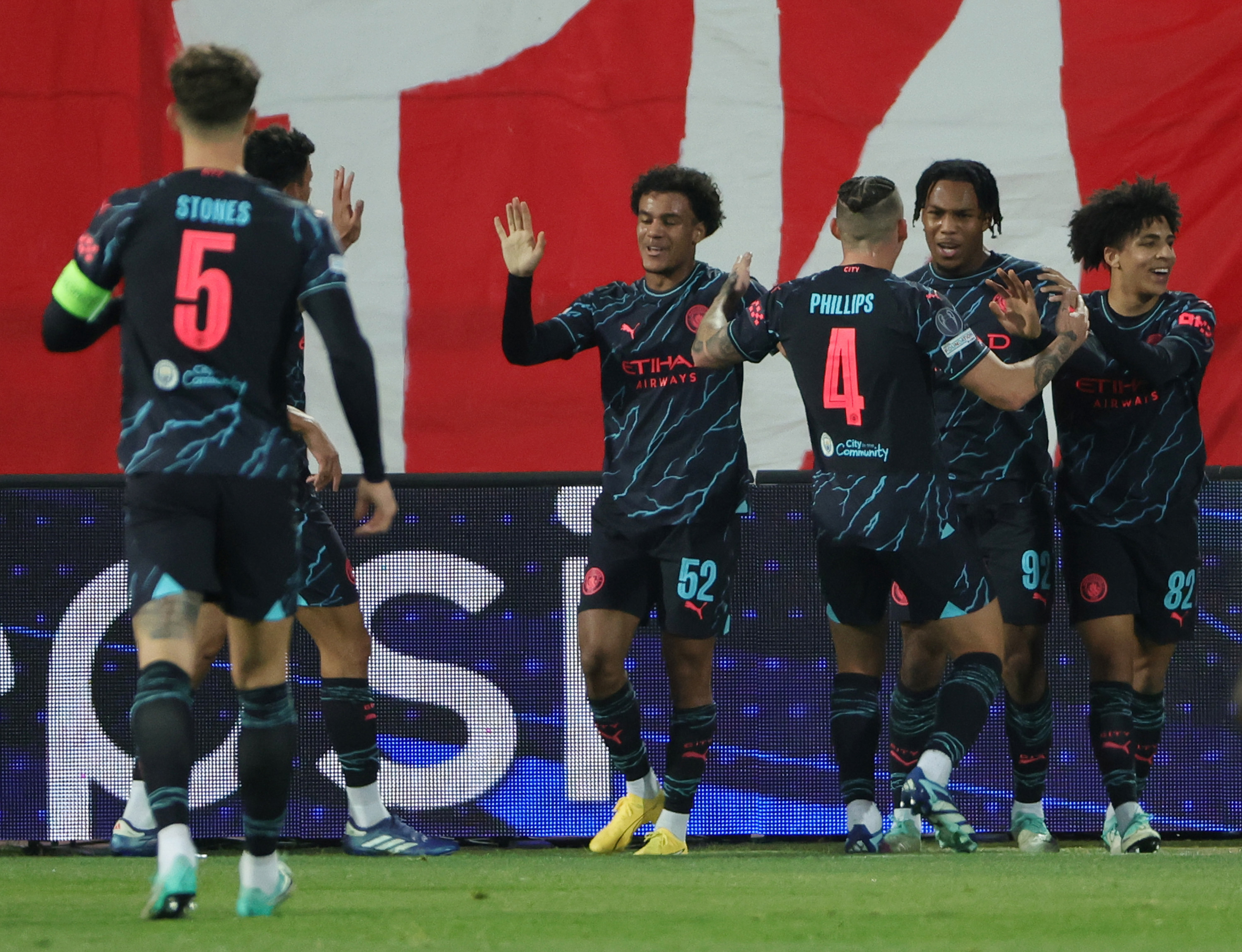 BELGRADE, SERBIA - DECEMBER 13: Micah Hamilton of Manchester City celebrates with teammates after scoring their team's first goal during the UEFA Champions League match between FK Crvena zvezda and Manchester City at Stadion Rajko Miti on December 13, 2023 in Belgrade, Serbia. (Photo by Srdjan Stevanovic/Getty Images)