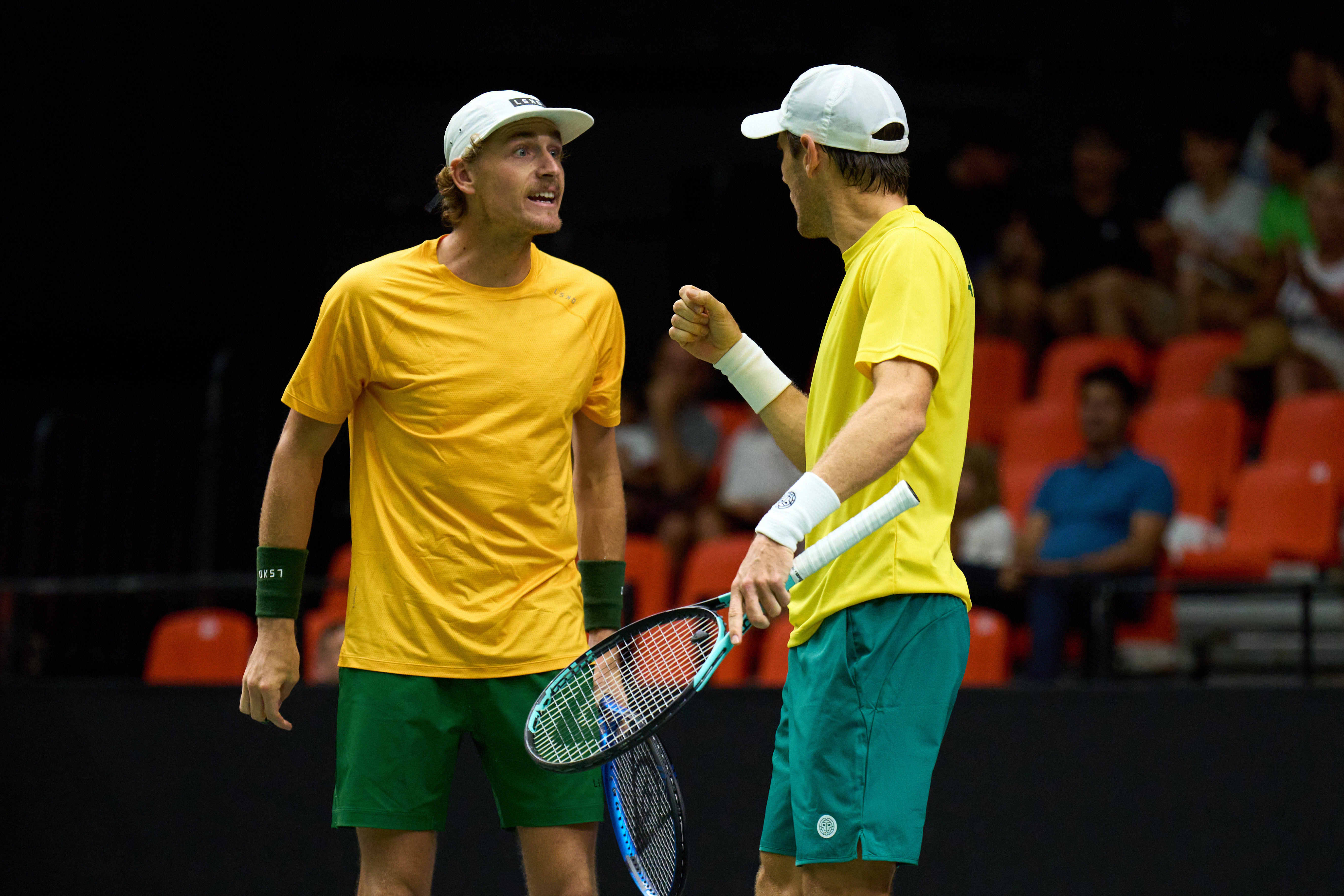 Matthew Ebden and Max Purcell of Australia celebrate beating France.