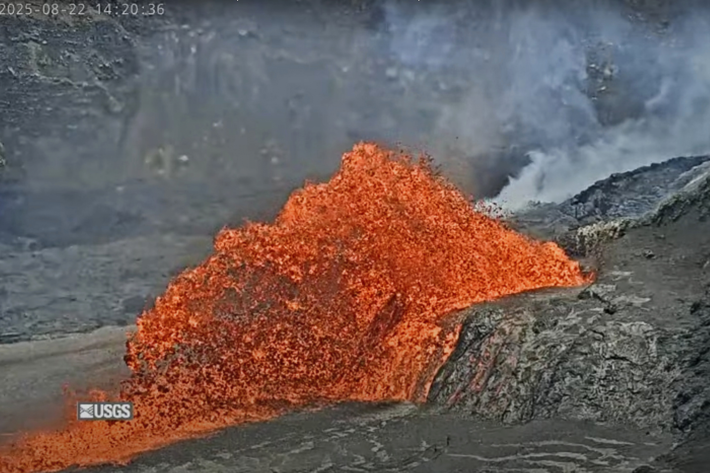 In this screenshot taken from video provided by the U.S. Geological Survey, the Kilauea volcano spews lava on Friday, Aug. 22, 2025, in Hawaii Volcanoes National Park, Hawaii. (U.S. Geological Survey via AP)
