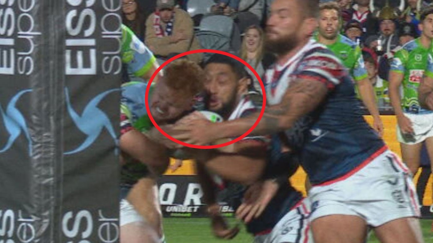 Isaac Liu clashes heads with Corey Horsburgh.