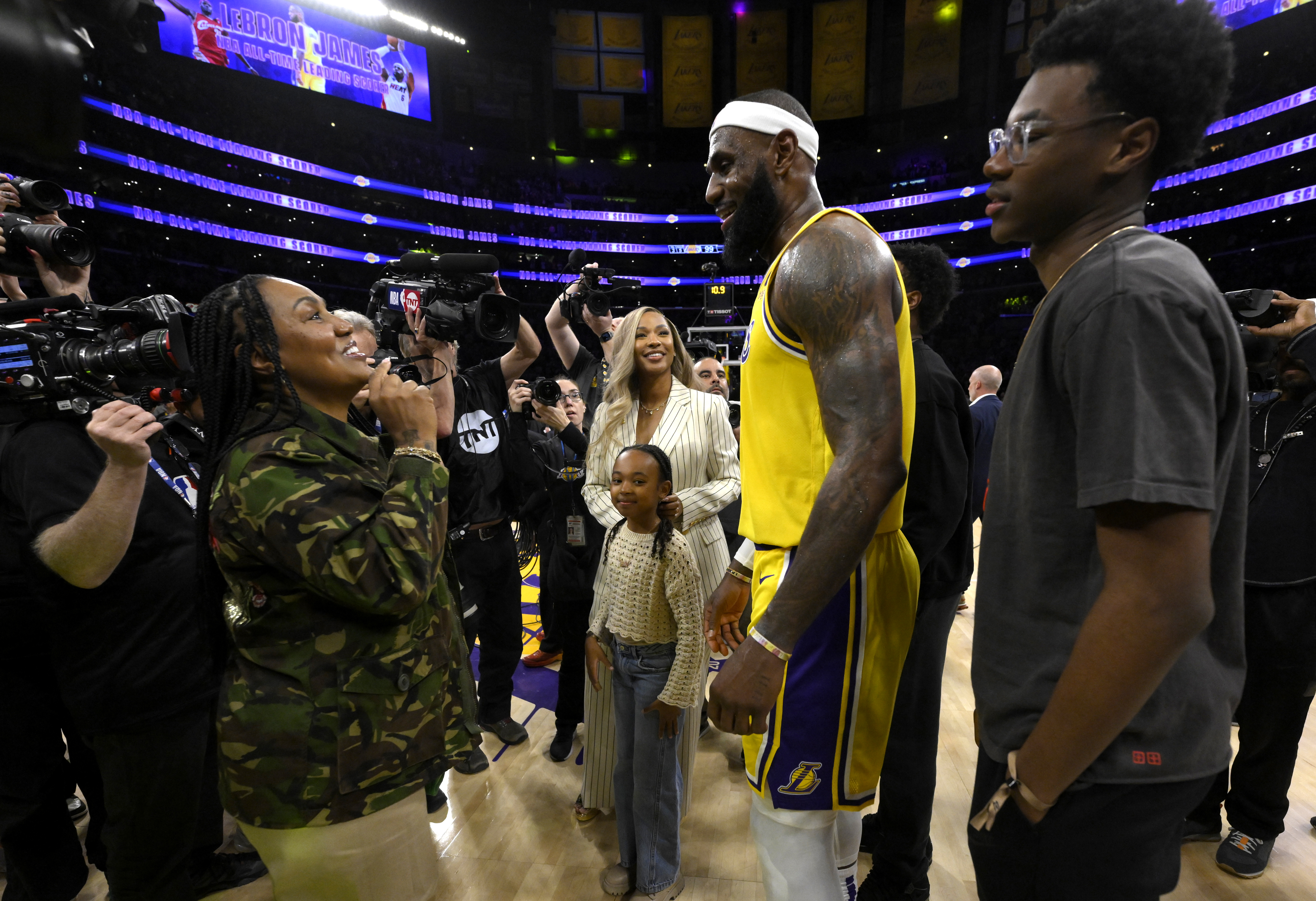 Los Angeles, CA - February 07: LeBron James #6 of the Los Angeles Lakers celebrates with his mom Gloria James, left, and wife Savannah James, center, and daughter Zhuri James along with son Byrce James, right, after breaking Hall of Fame and former Los Angeles Lakers Kareem Abdul Jabbar scoring record (38,387) in the second half of a NBA basketball game against Oklahoma City Thunder at the Crypto.com Arena in Los Angeles on Tuesday, February 7, 2023. (Photo by Keith Birmingham/MediaNews Group/P