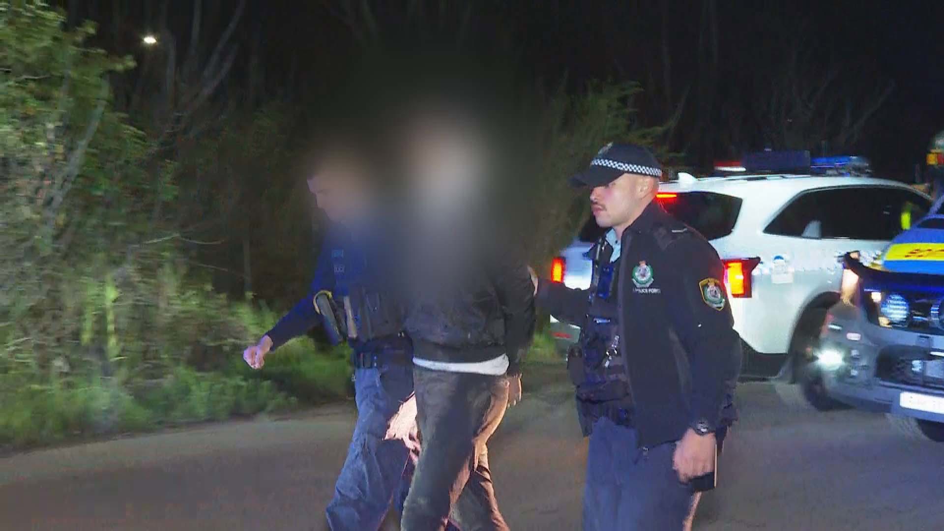 Five men as young as 16 have been arrested after allegedly breaking into a home in Sydney's west and sparking a chase in a stolen car which saw a police car struck.They allegedly forced their way into the house in Adah Street, Guildford with police called just after midnight today.