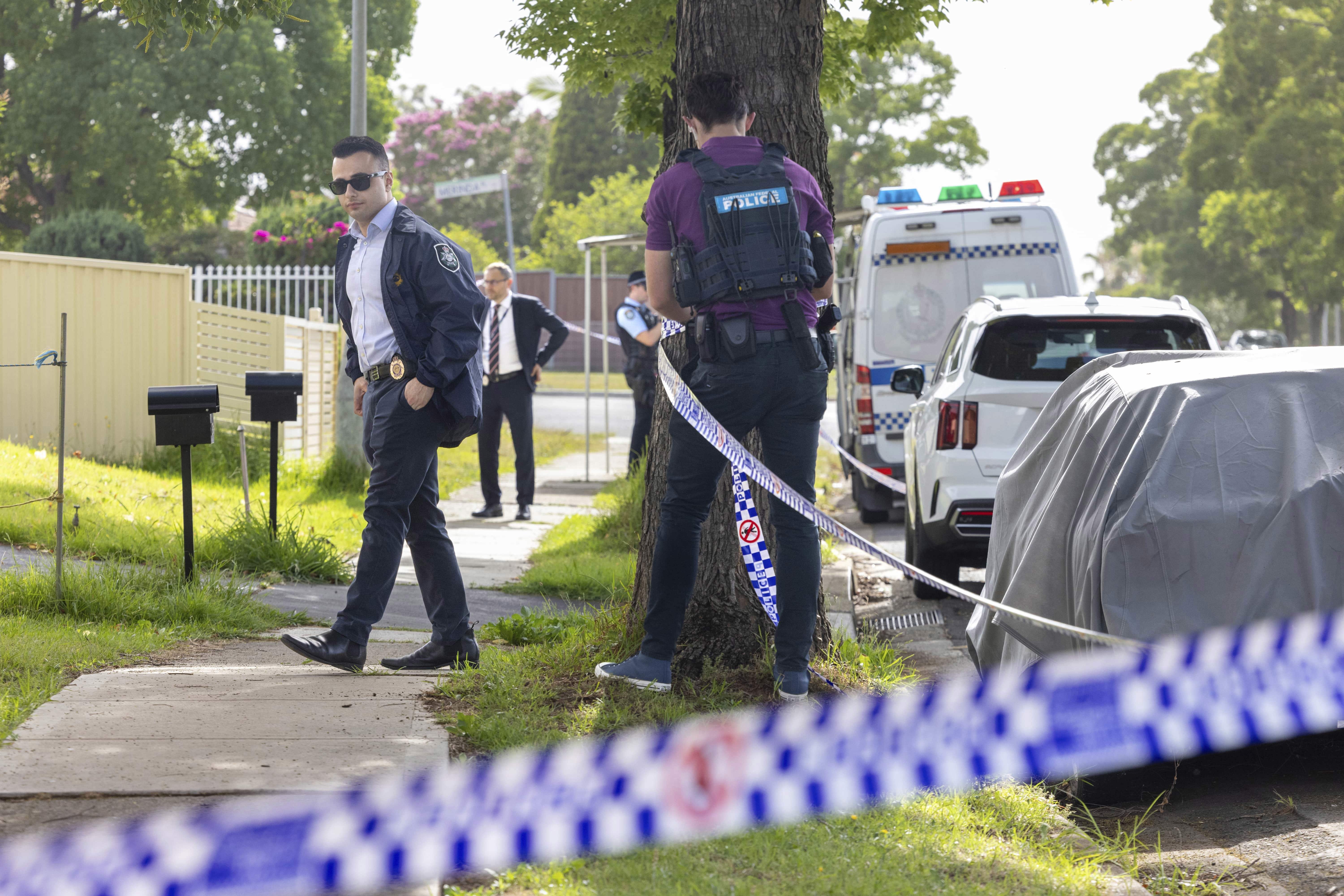 Police at a property in Bonnyrigg this morning, believed to be where the alleged Bondi Beach shooting gunmen lived.