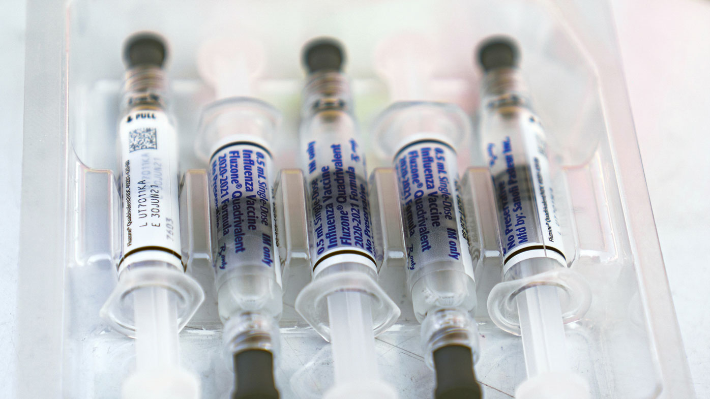 A box of Influenza vaccine, Fluzone Quadrivalent 2020-2021 Formula, made by Sanofi Pasteur Inc., is opened for use during L.A. Care Health Plan and Blue Shield of California Promise Health Plan's Community Resource Center's Free Drive-Thru vaccination event at the Exposition Park in Los Angeles, Saturday, Oct. 17, 2020.