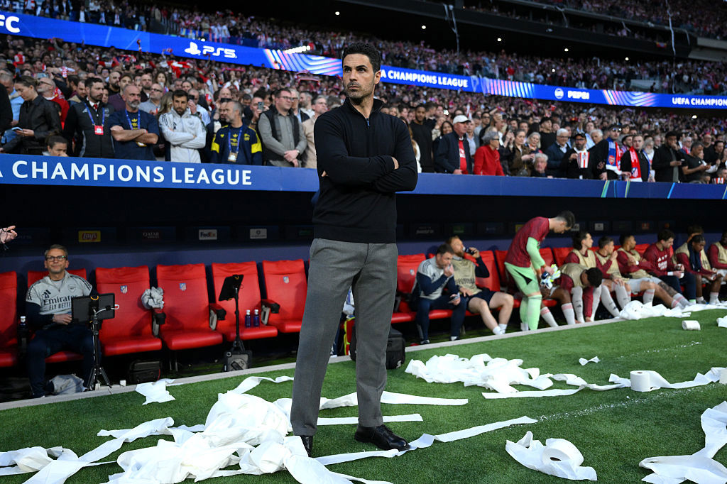 Mikel Arteta looks on surrounded by toilet roll.