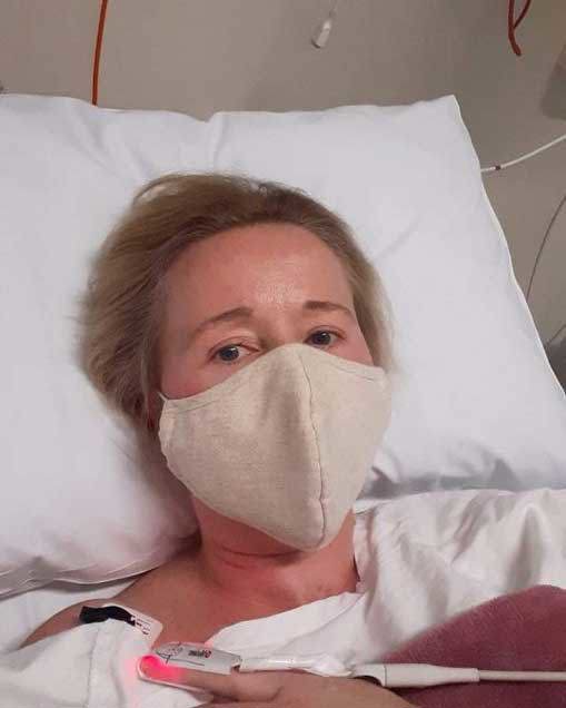 Christie Smith, pictured in hospital during the pandemic, having a transfusion to try to manage her pain.