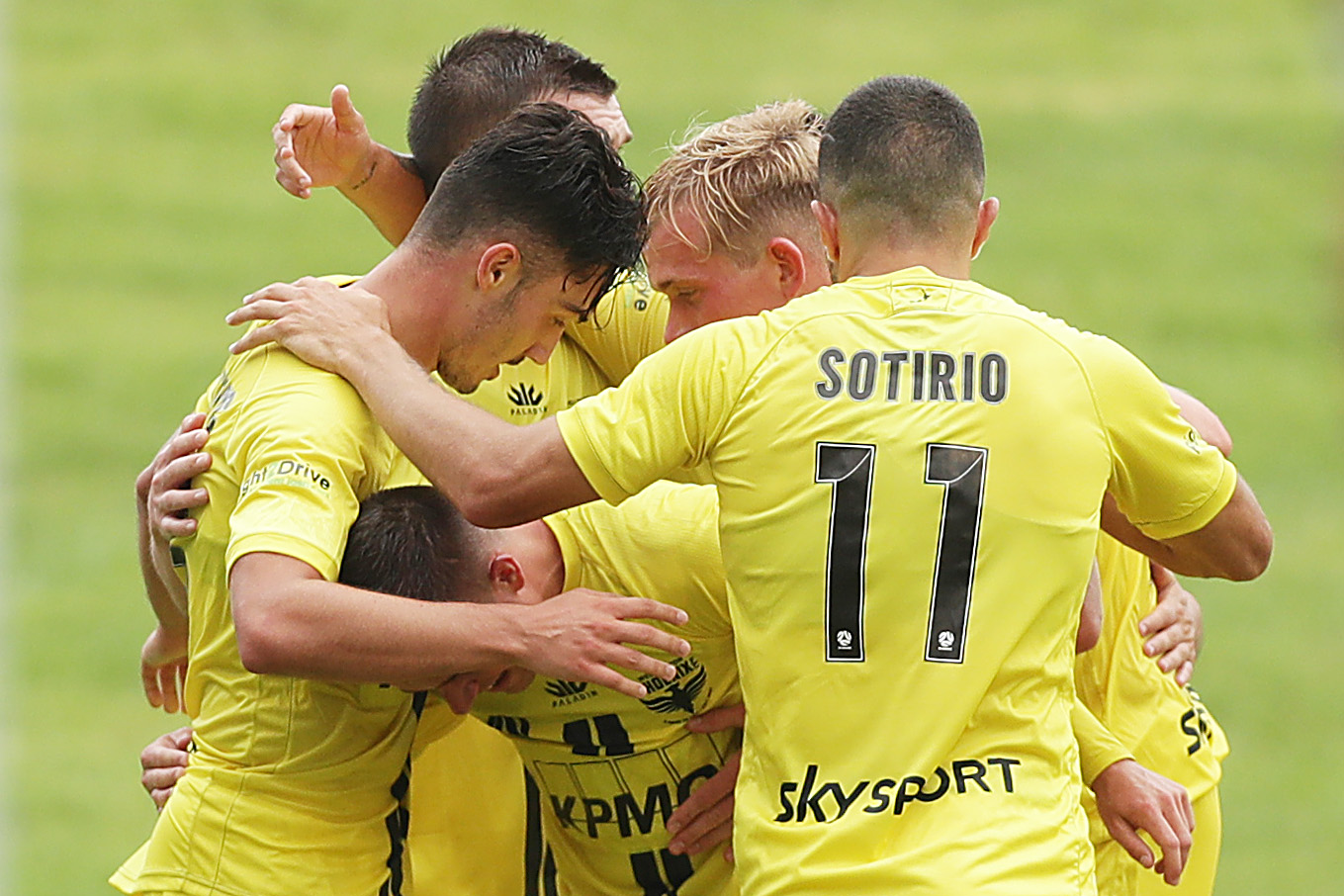 Mirza Muratovic of the Phoenix celebrates scoring a goal with teammates.