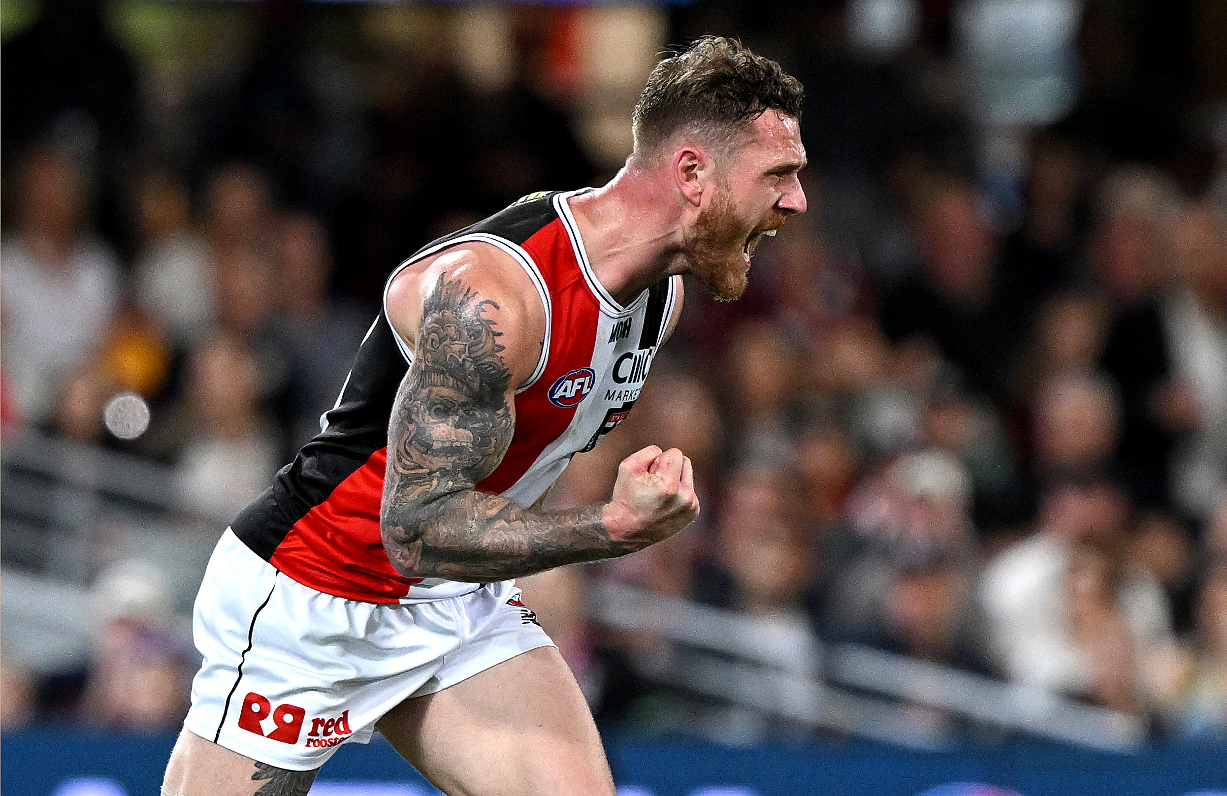 Tim Membrey of the Saints celebrates after kicking a goal during the round 24 AFL match between the Brisbane Lions and St Kilda Saints at The Gabba, on August 26, 2023, in Brisbane, Australia. (Photo by Bradley Kanaris/Getty Images)