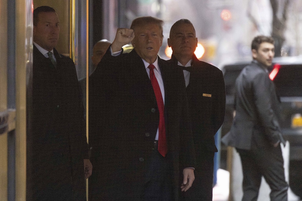 Former President Donald Trump leaves his apartment building, Friday, Jan 26, 2024, in New York.