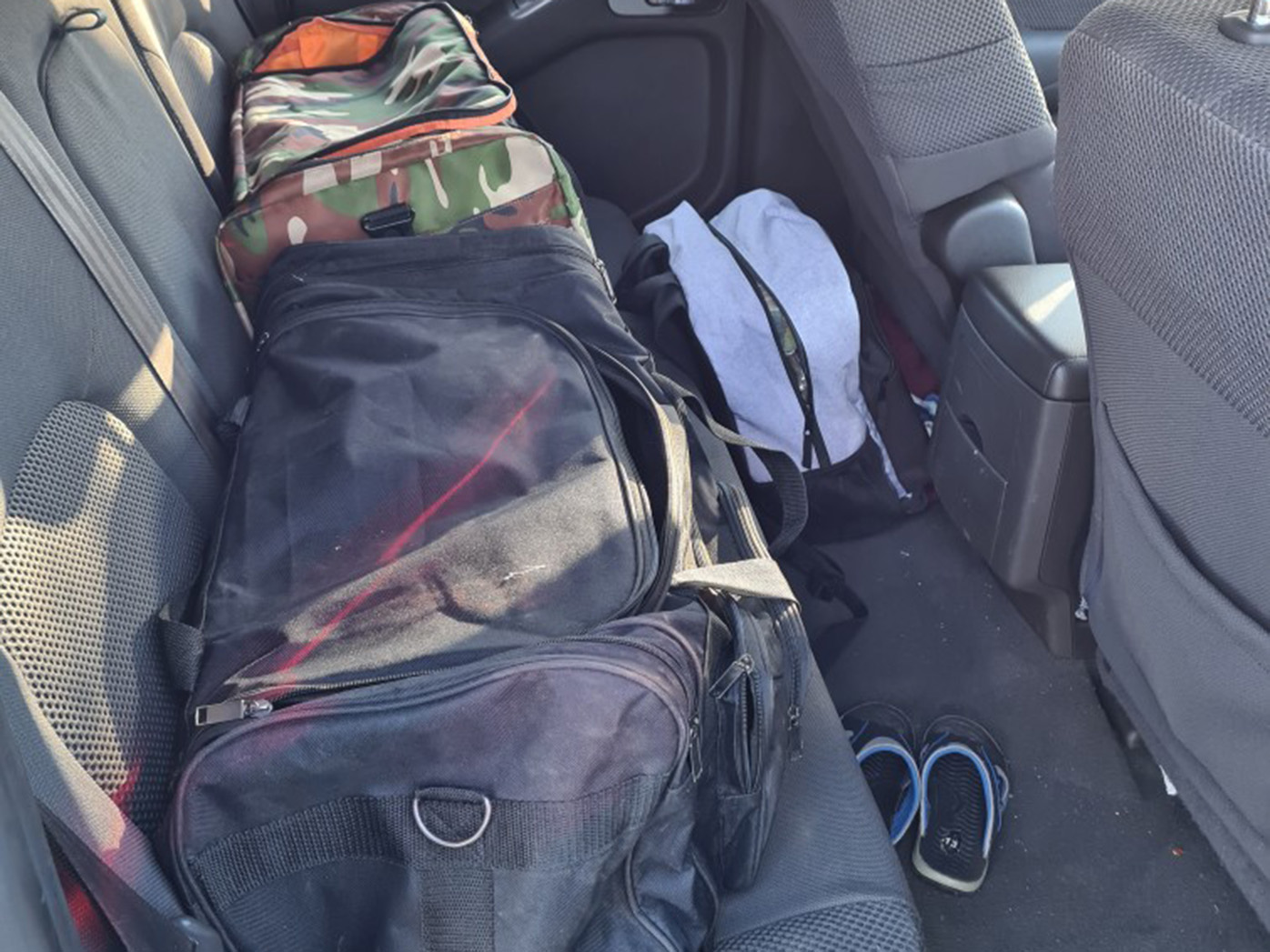 The cash was found in bags in the rear of the car.