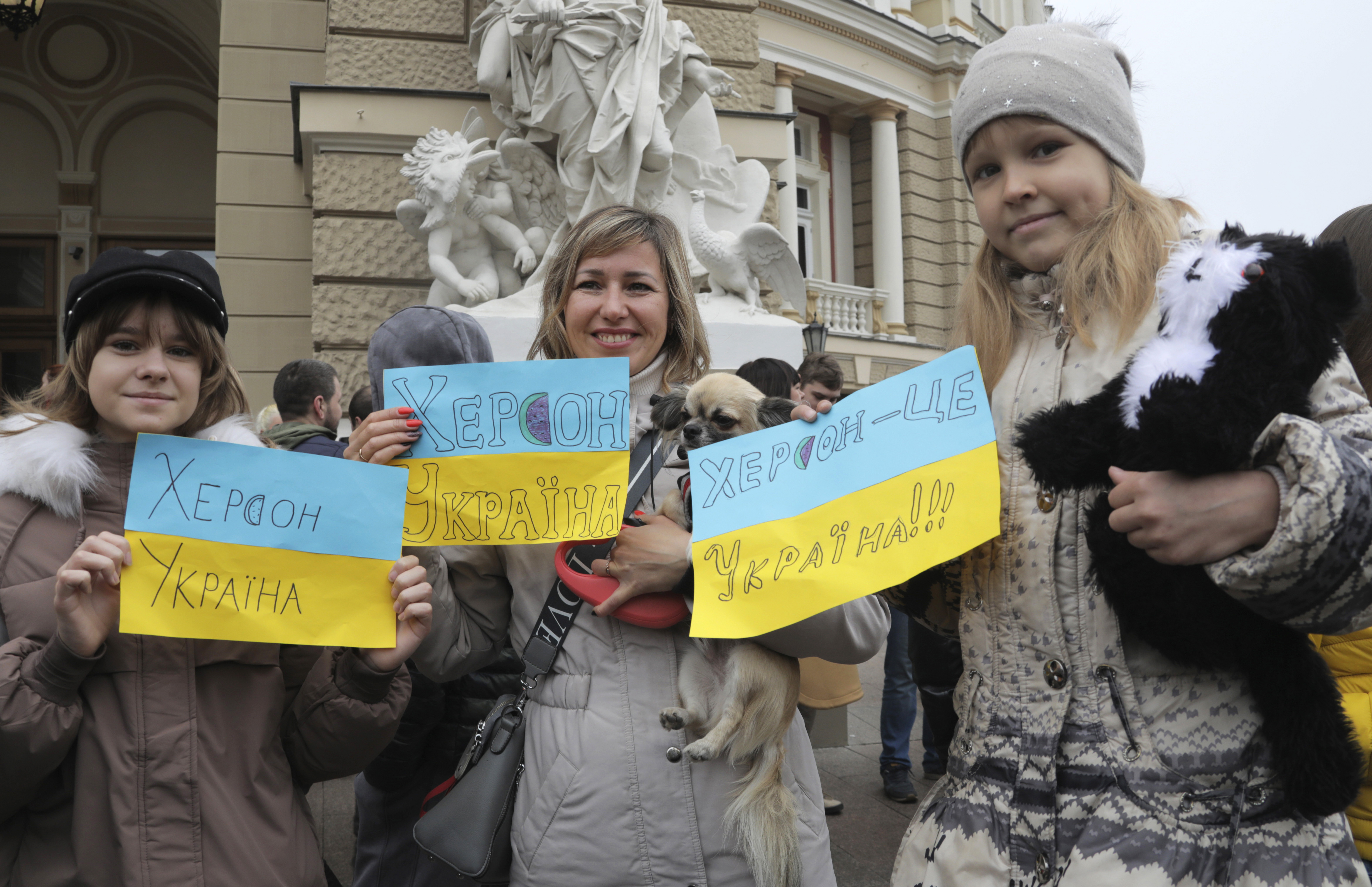 Ukrainians gather in downtown to celebrate the recapturing of Kherson city, Ukraine, Odesa, Saturday, Nov. 12, 2022. 