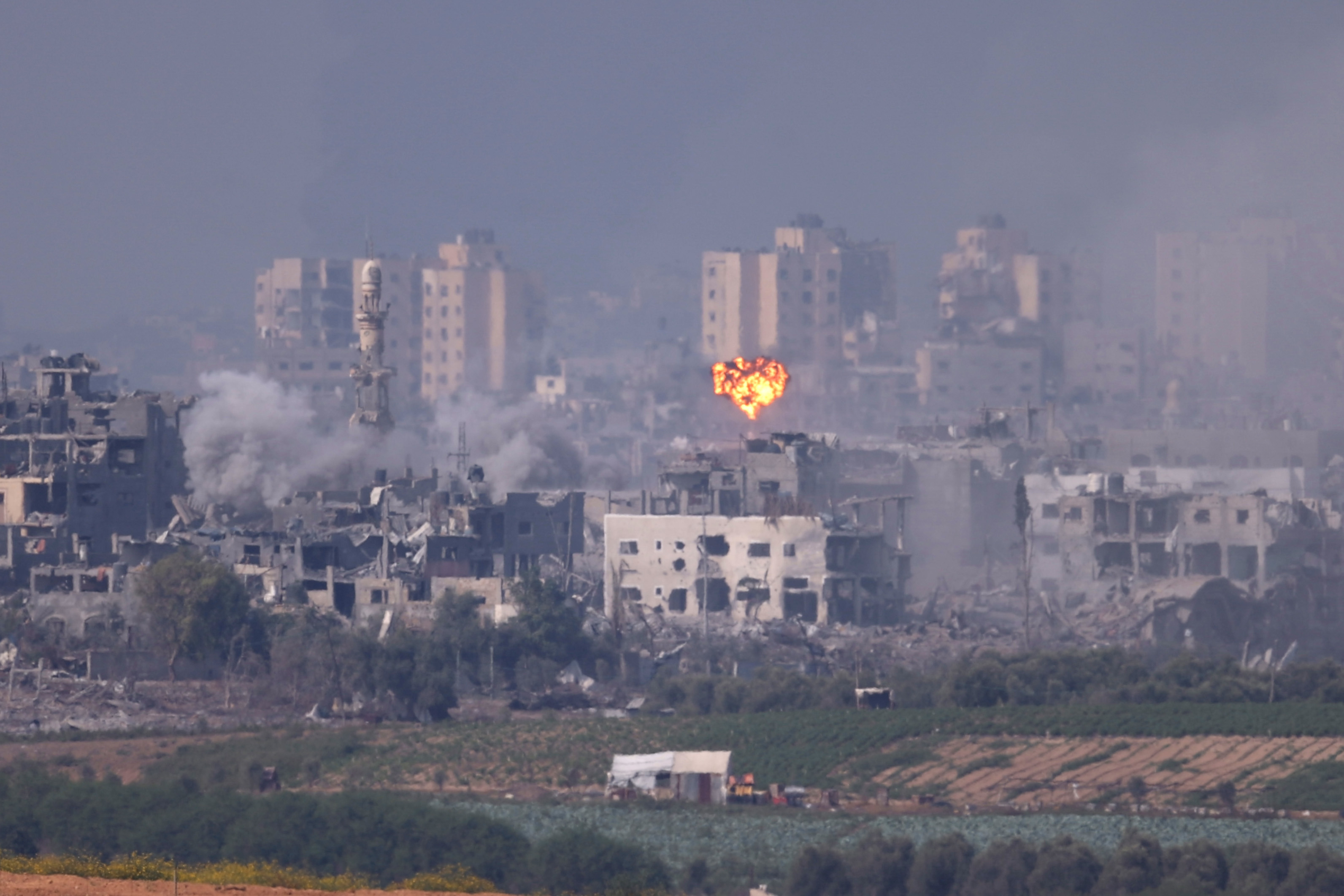 Smoke rises from an explosion in Gaza on October 28, 2023 in Sderot, Israel. 