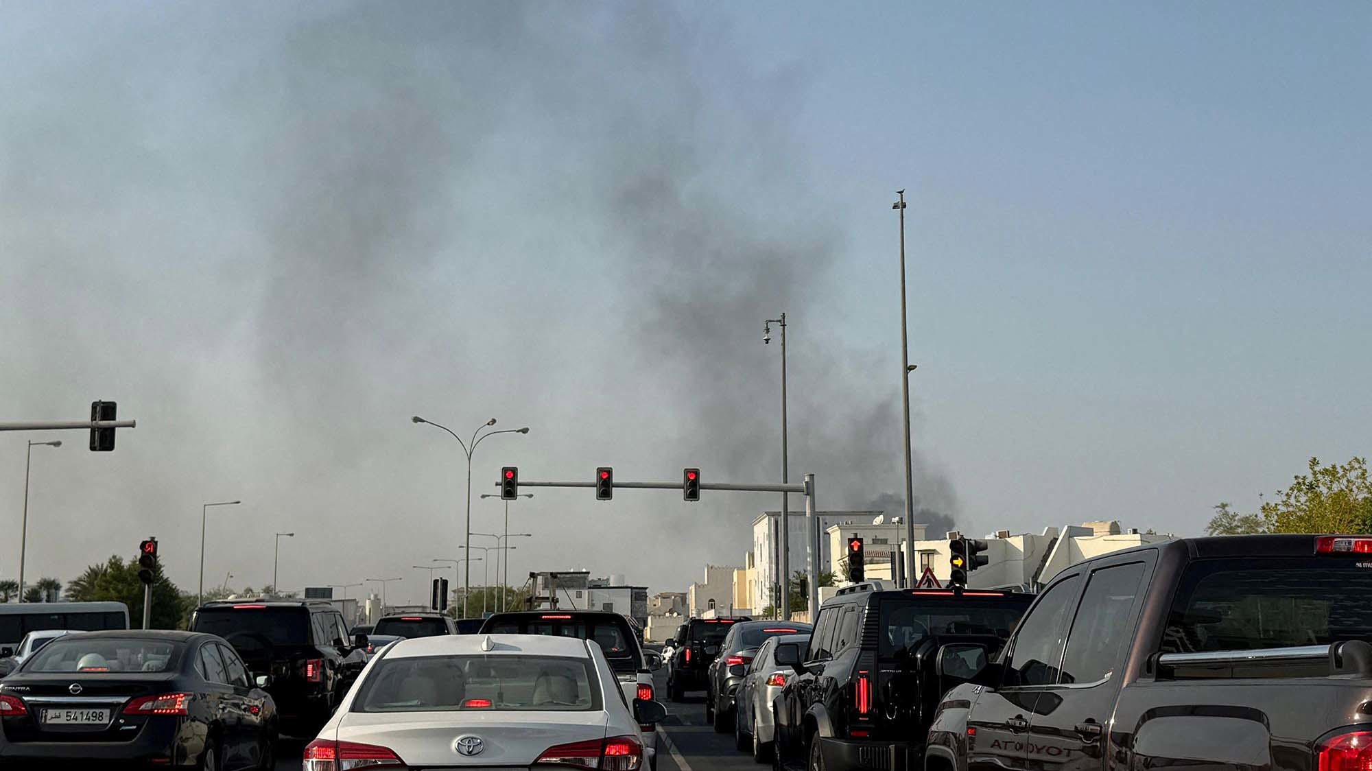 Smoke rises after several blasts were heard in Doha, Qatar, on Tuesday