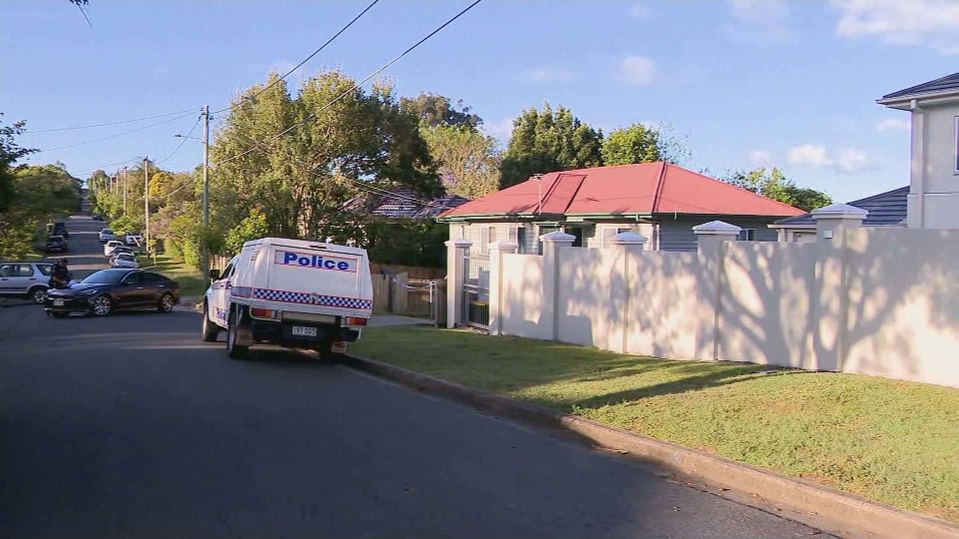 A man has been shot in broad daylight in Brisbane.Two people have been arrested, while police are hunting at least one other suspect.