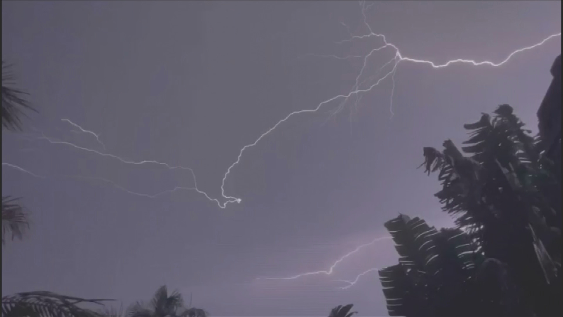 South-east Queensland has been battered by wild winds, lightning and golf-ball-sized hail, destroying a single mother's home in Brisbane's south.