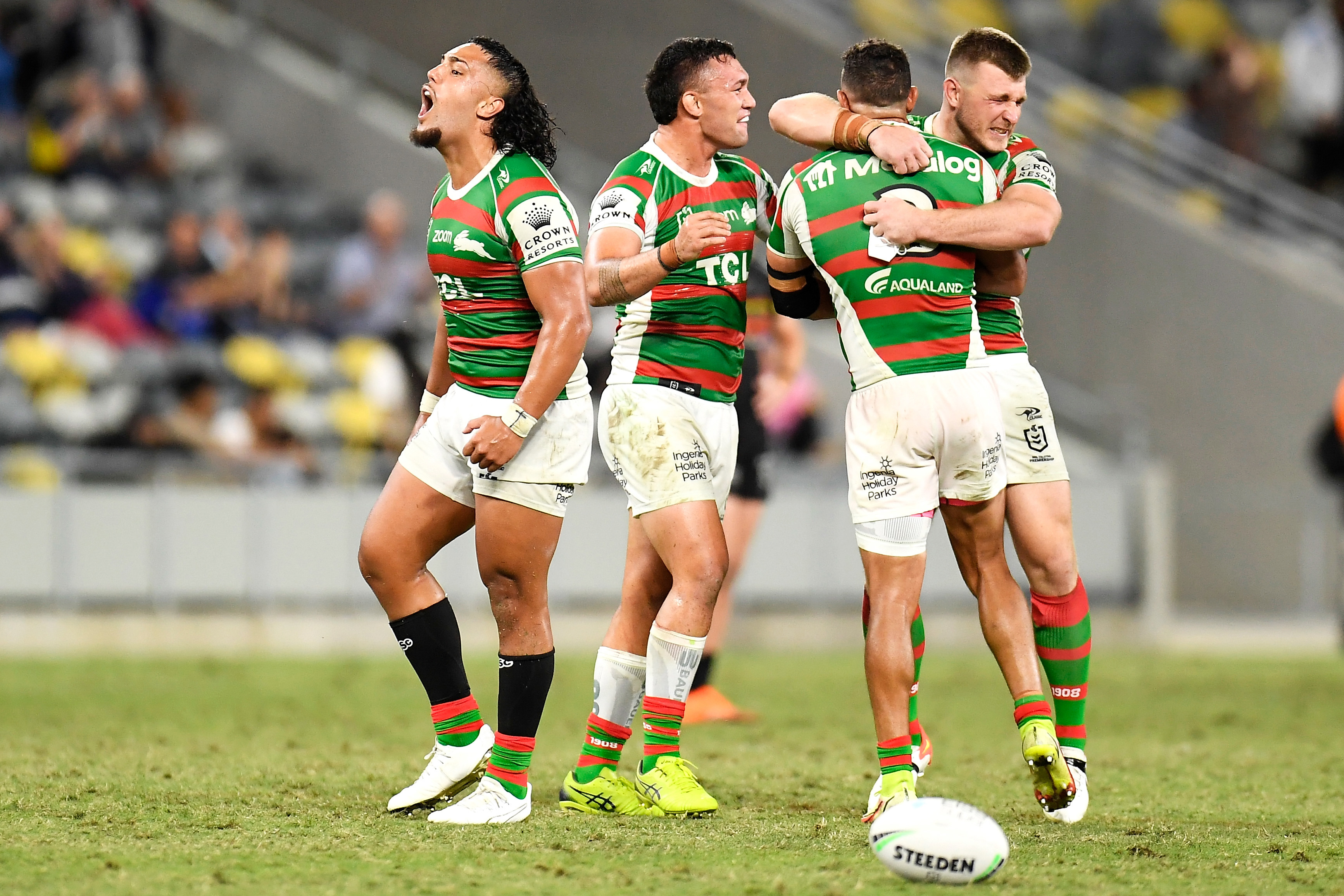 Keaon Koloamatangi, Jaydn Su'A, Dane Gagai and Jai Arrow of the Rabbitohs celebrate victory during the 2021 NRL qualifying final match against the Penrith Panthers.