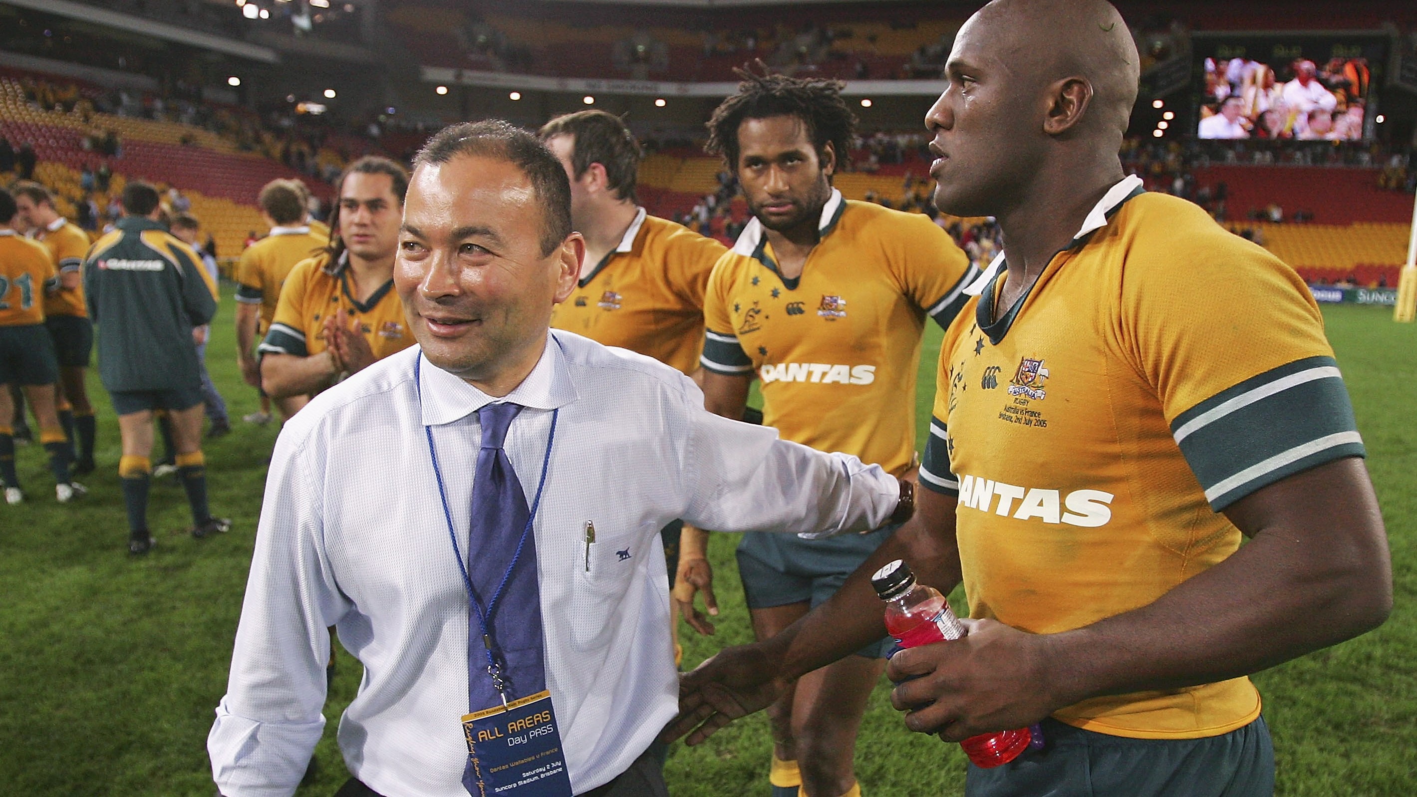 Wallabies coach Eddie Jones congratulates Wendell Sailor after defeating France in Brisbane in 2005.