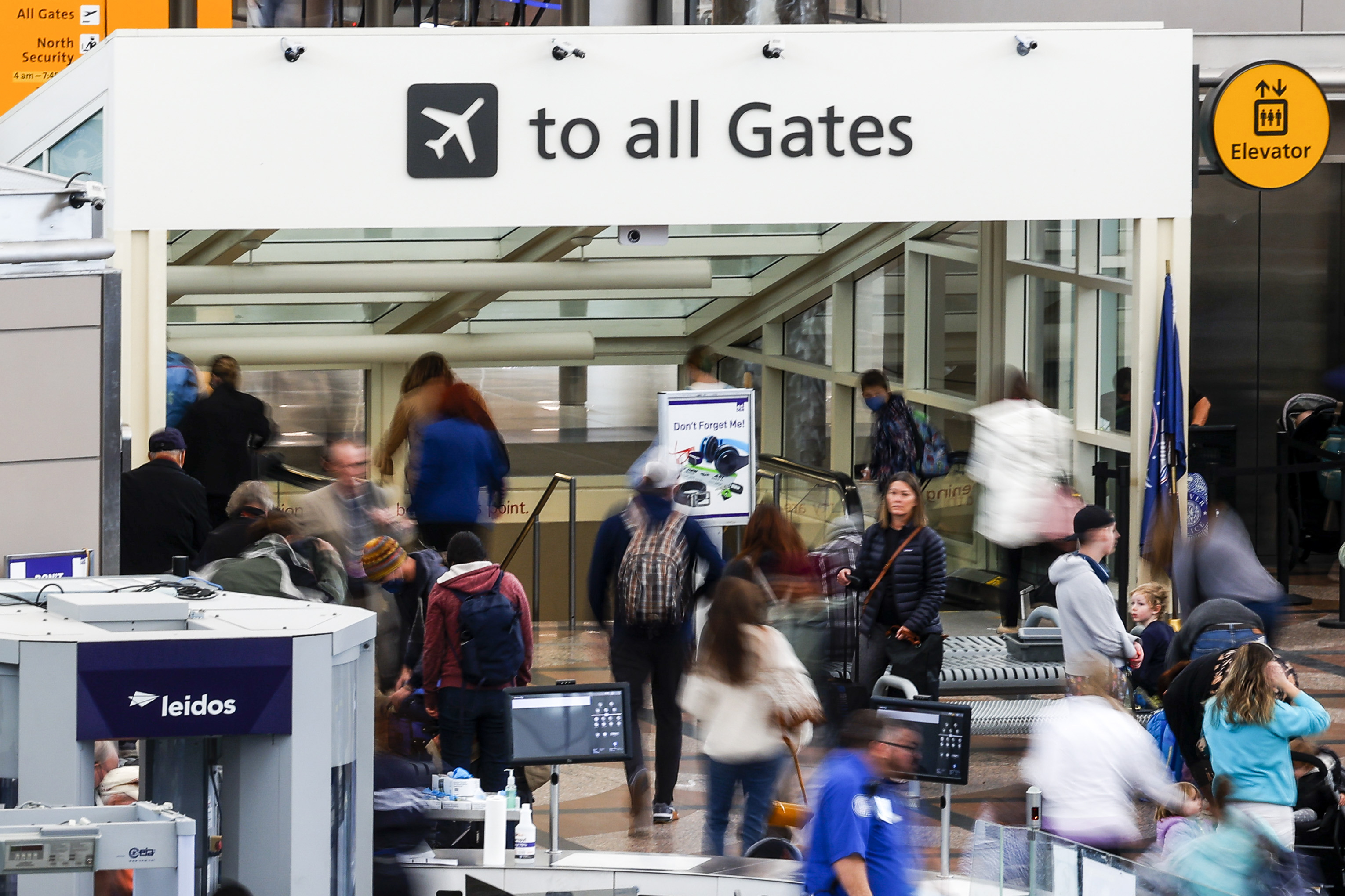 DENVER, CO - FEBRUARY 22: Travelers head toward their gates after passing through a TSA security checkpoint during a winter storm at Denver International Airport on February 22, 2023 in Denver, Colorado. More than 1000 flights have been canceled across the U.S. as the storm impacts travel around the country. (Photo by Michael Ciaglo/Getty Images)