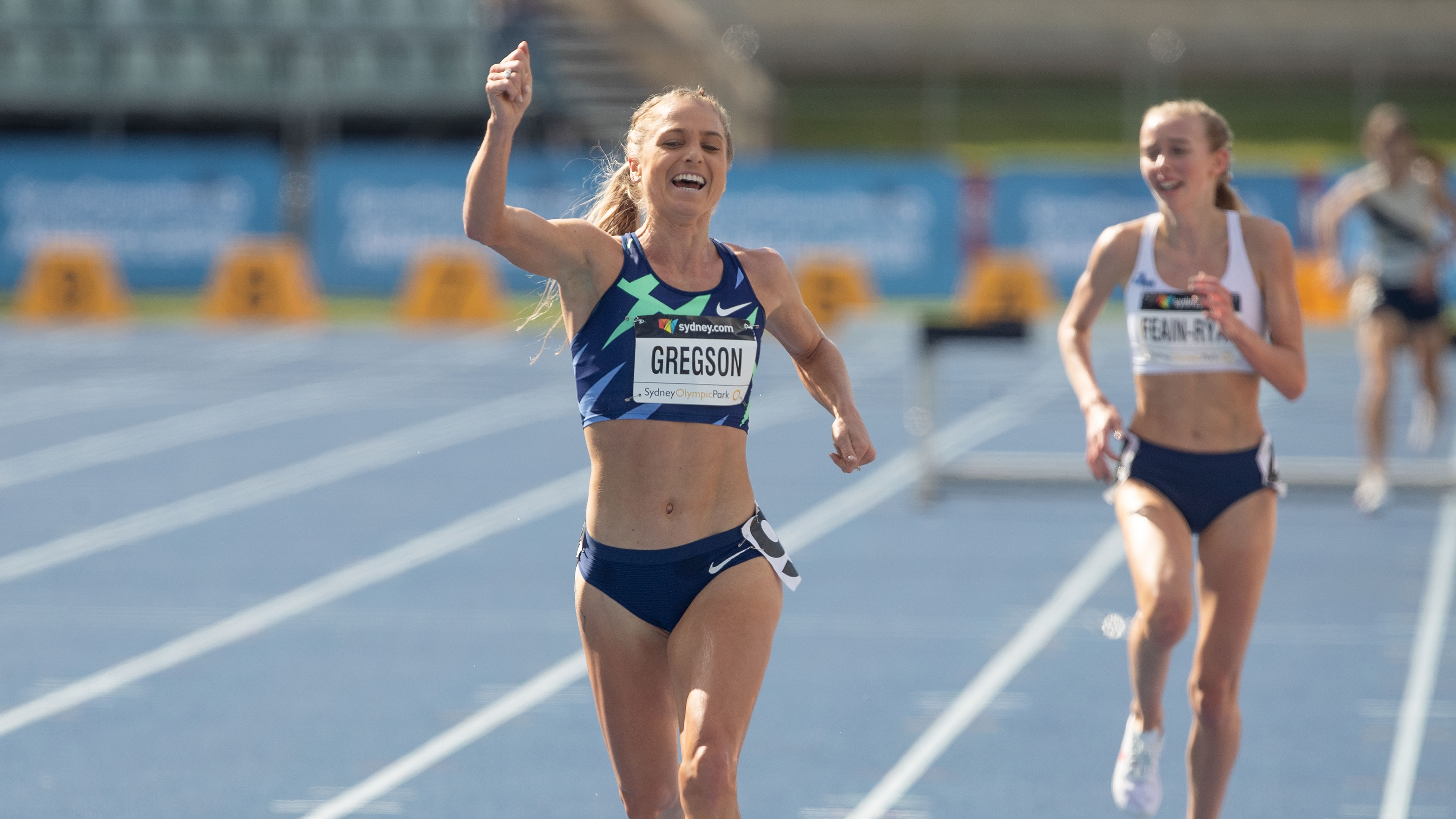 Genevieve Gregson celebrates her win in the 3000m steeplechase. Photo: Steve Christo