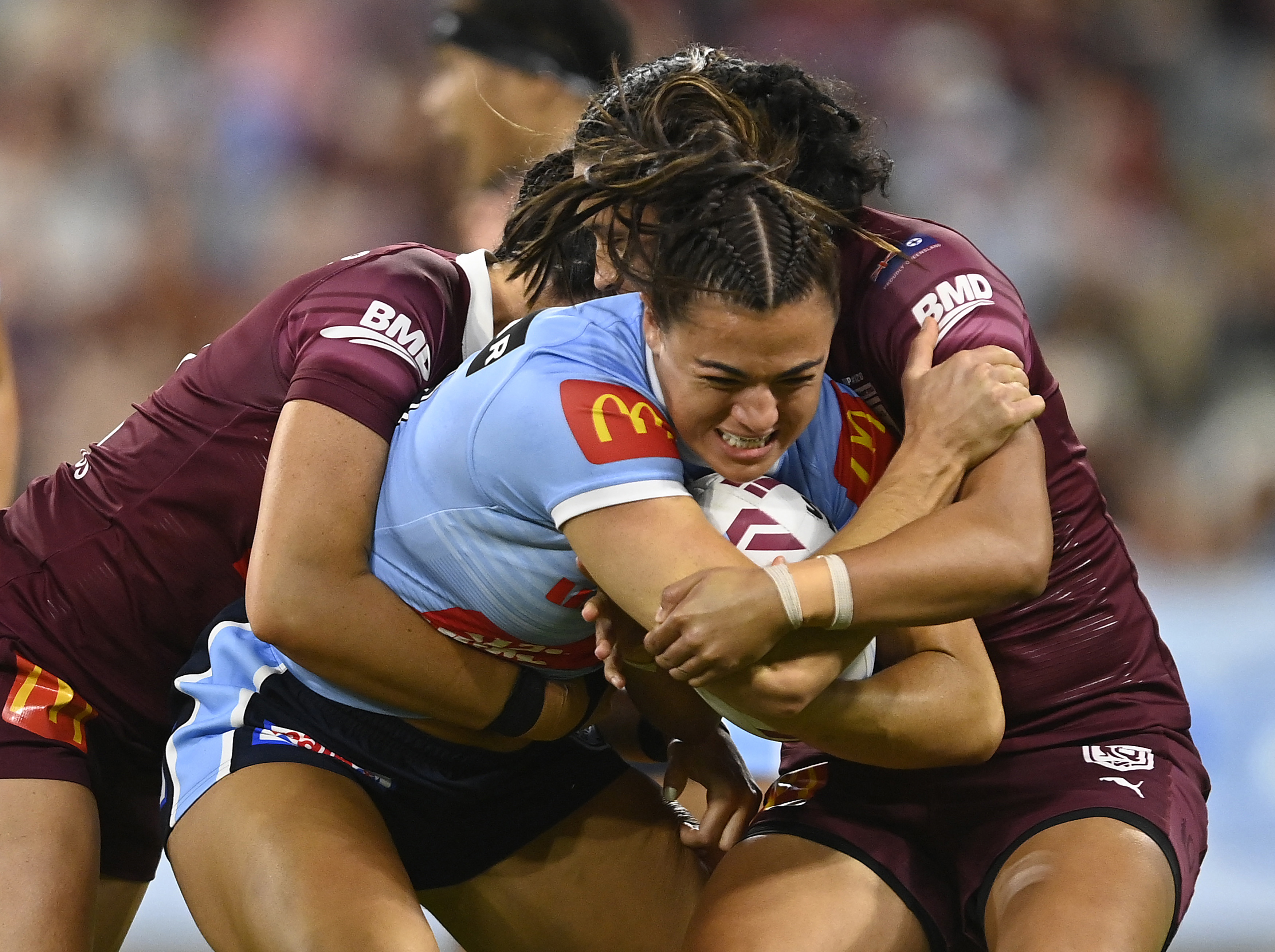 TOWNSVILLE, AUSTRALIA - JUNE 22: Millie Boyle of the Blues is tackled during game two of the women's state of origin series between New South Wales Skyblues and Queensland Maroons at Queensland Country Bank Stadium on June 22, 2023 in Townsville, Australia. (Photo by Ian Hitchcock/Getty Images)