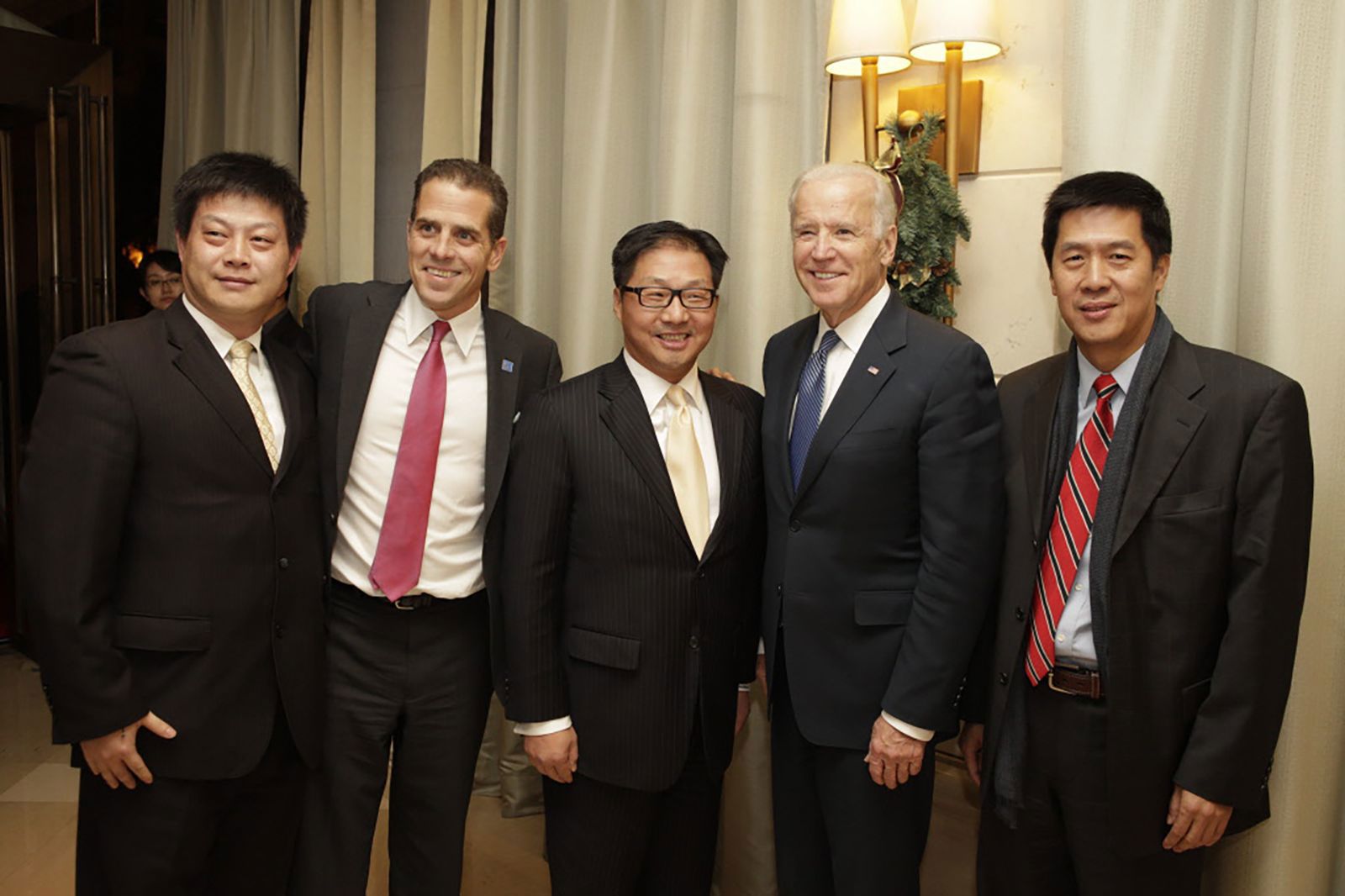 Newly released pictures show then-Vice President Joe Biden meeting some of his son Hunter Biden's Chinese business partners