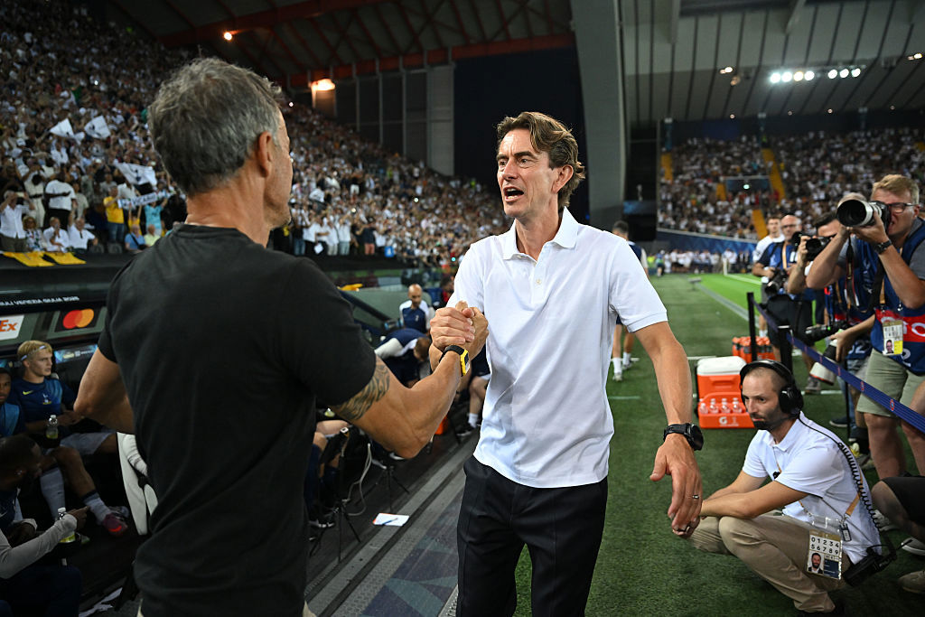 Thomas Frank shakes hands with Luis Enrique.