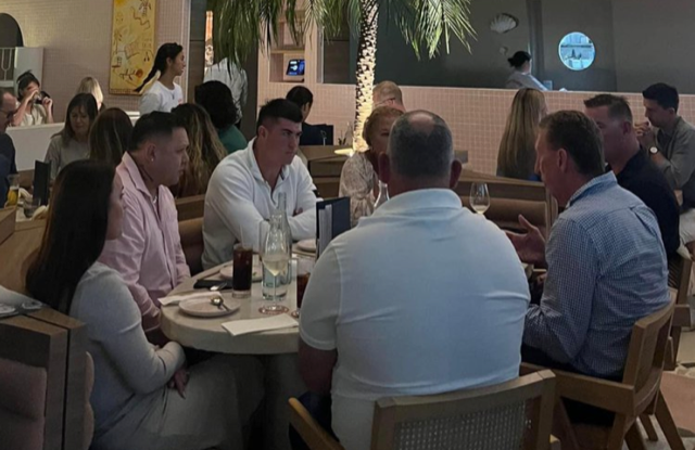 Knights centre Bradman Best (centre, white shirt) was seen meeting with coach Adam O'Brien and football boss Peter Parr.