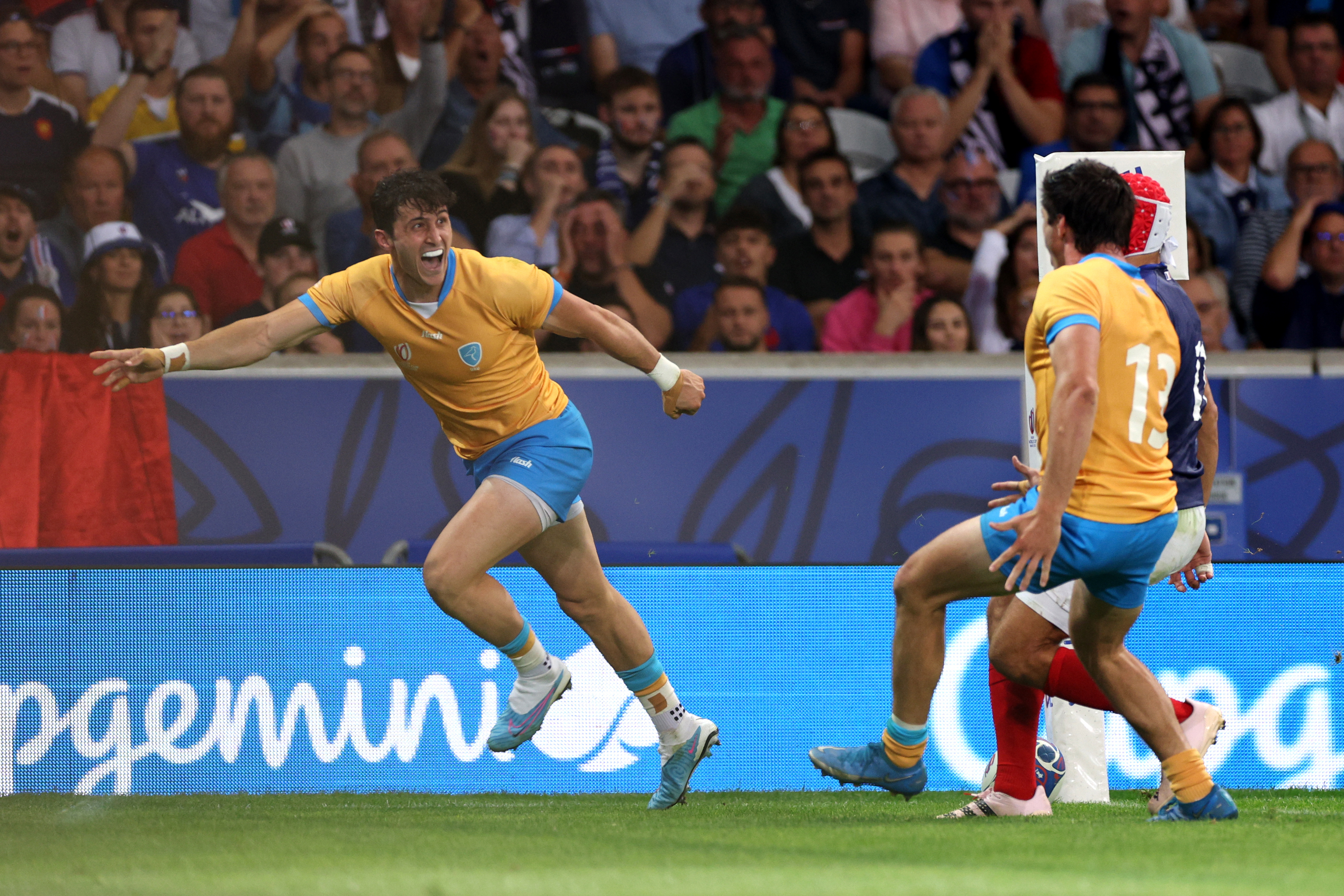 Baltazar Amaya (left) of Uruguay celebrates with Tomas Inciarte (right) of Uruguay after scoring his team's second try against France.