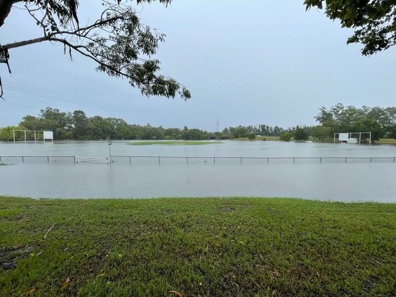 A sporting field resembles a lake after flooding in the Gold Coast.