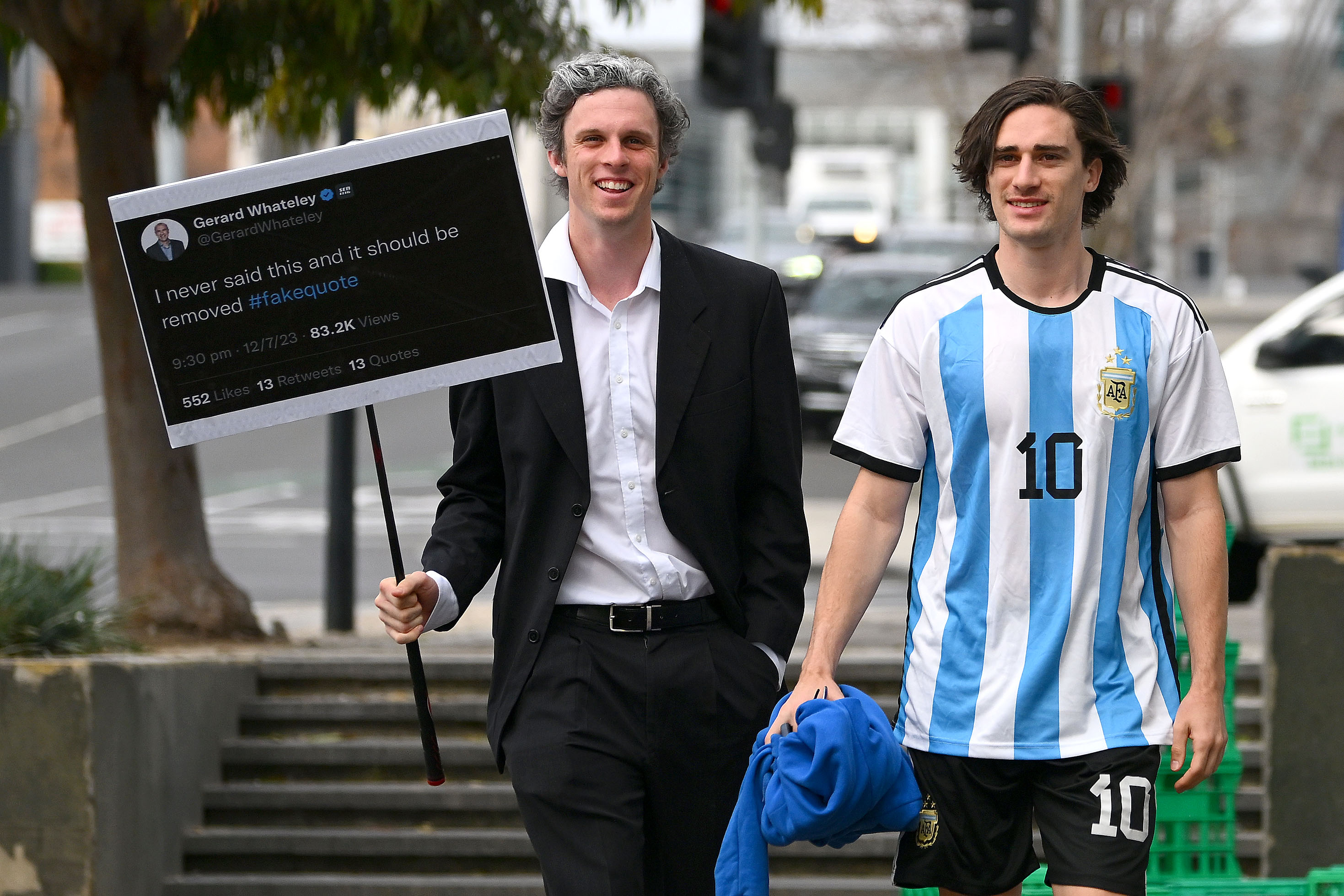 GEELONG, AUSTRALIA - AUGUST 28: Max Holmes and Gryan Miers of the Cats arrive during the 2023 Geelong Cats end of season gathering at the Wharf Shed on August 28, 2023 in Geelong, Australia. (Photo by Morgan Hancock/AFL Photos via Getty Images)