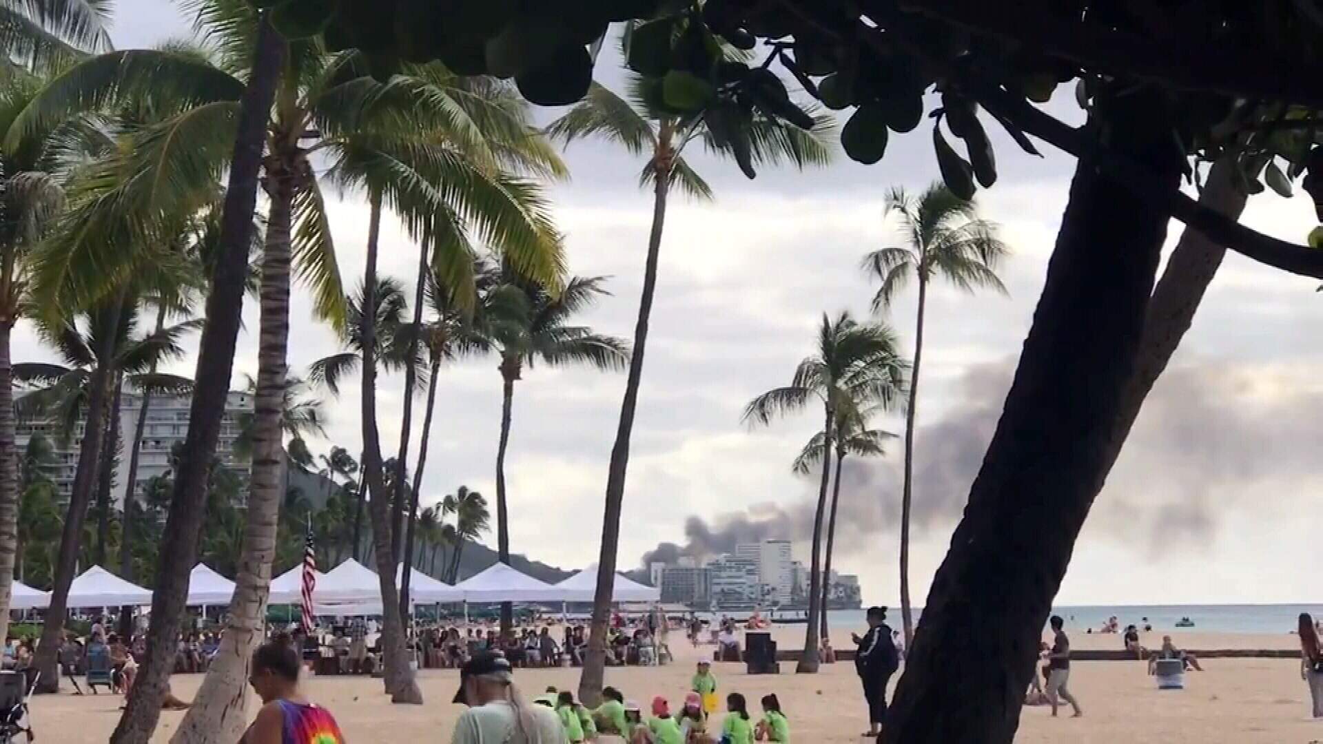 Smoke can be seen billowing from the area where an active shooter incident was unfolding on Monday (local time) in Honolulu, Hawaii.