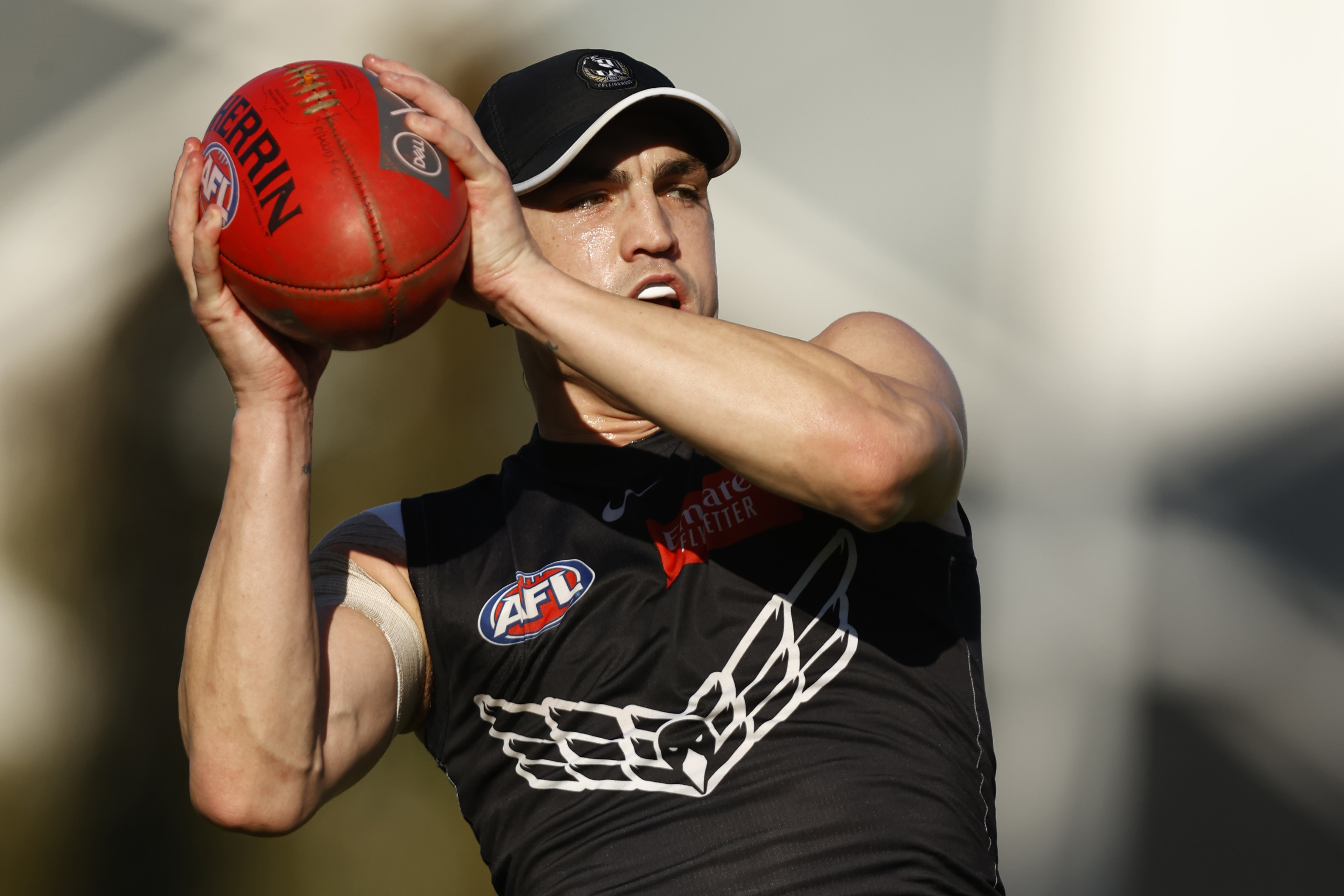 Brayden Maynard marks the ball during a Collingwood Magpies training session.
